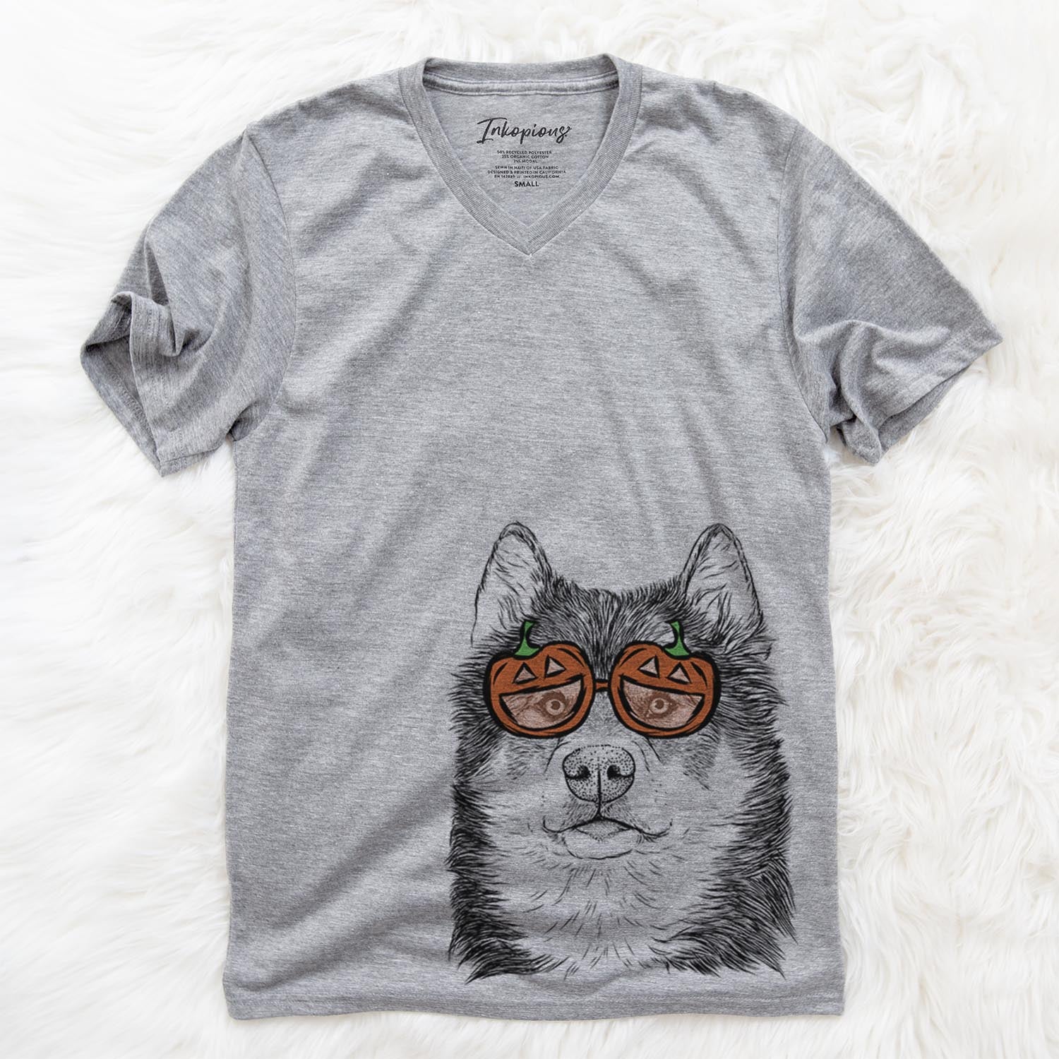 Hand-drawn sketch of Oskar the Candian Eskimo Dog wearing pumpkin glasses on a Grey pumpkin collection