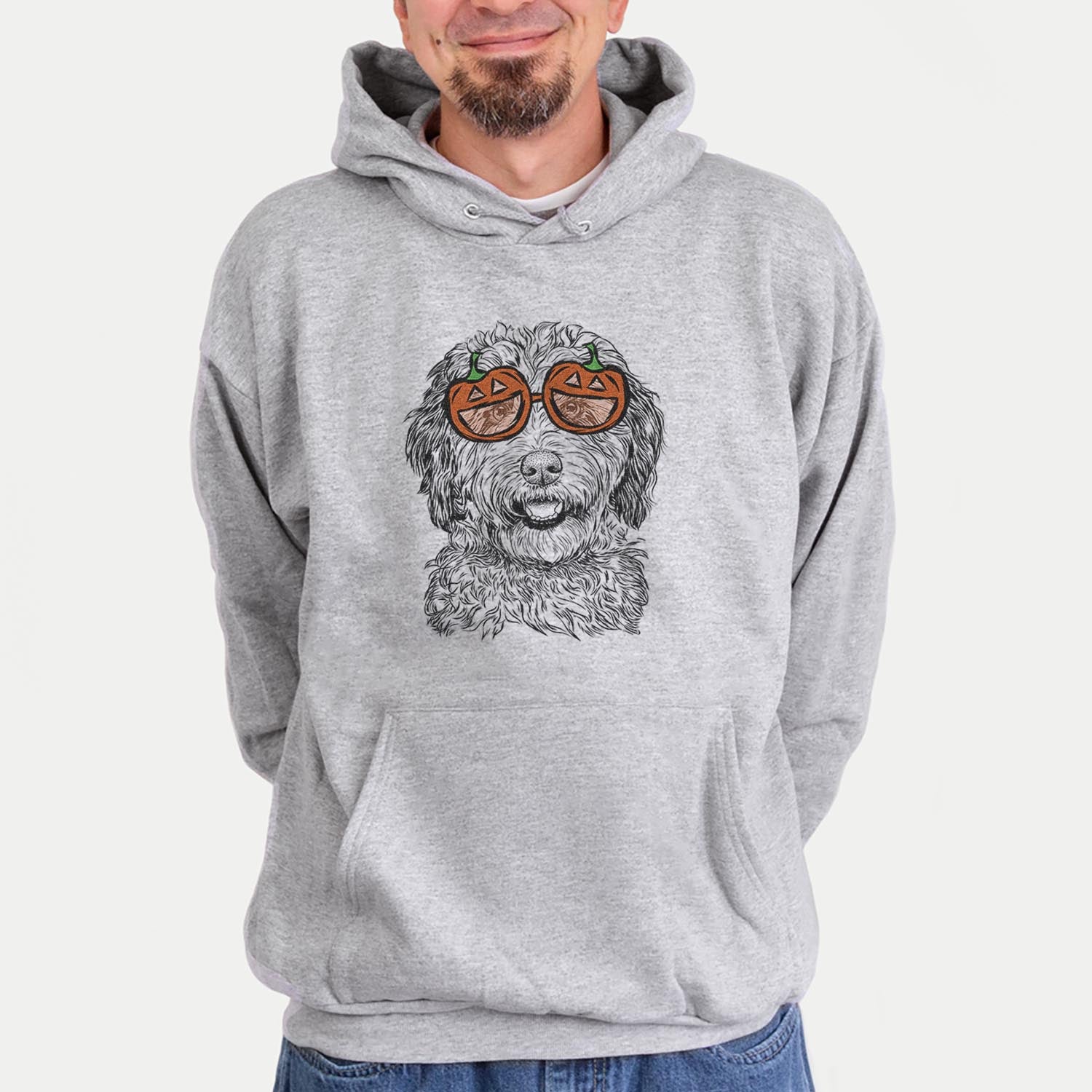 Hand-drawn sketch of Palmer the Aussiedoodle wearing pumpkin glasses on a Palmer Doodle pumpkin collection, hanging on a wall