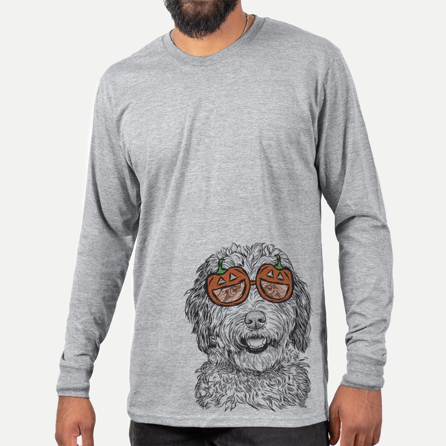 Hand-drawn sketch of Palmer the Aussiedoodle wearing pumpkin glasses on a Palmer Doodle pumpkin collection, hanging on a wall