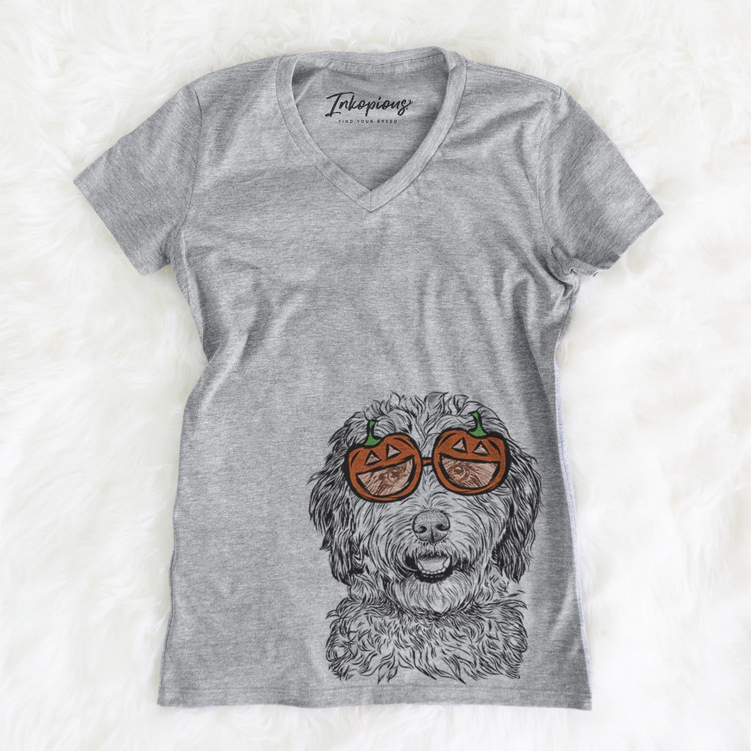 Hand-drawn sketch of Palmer the Aussiedoodle wearing pumpkin glasses on a Palmer Doodle pumpkin collection, on a hanger