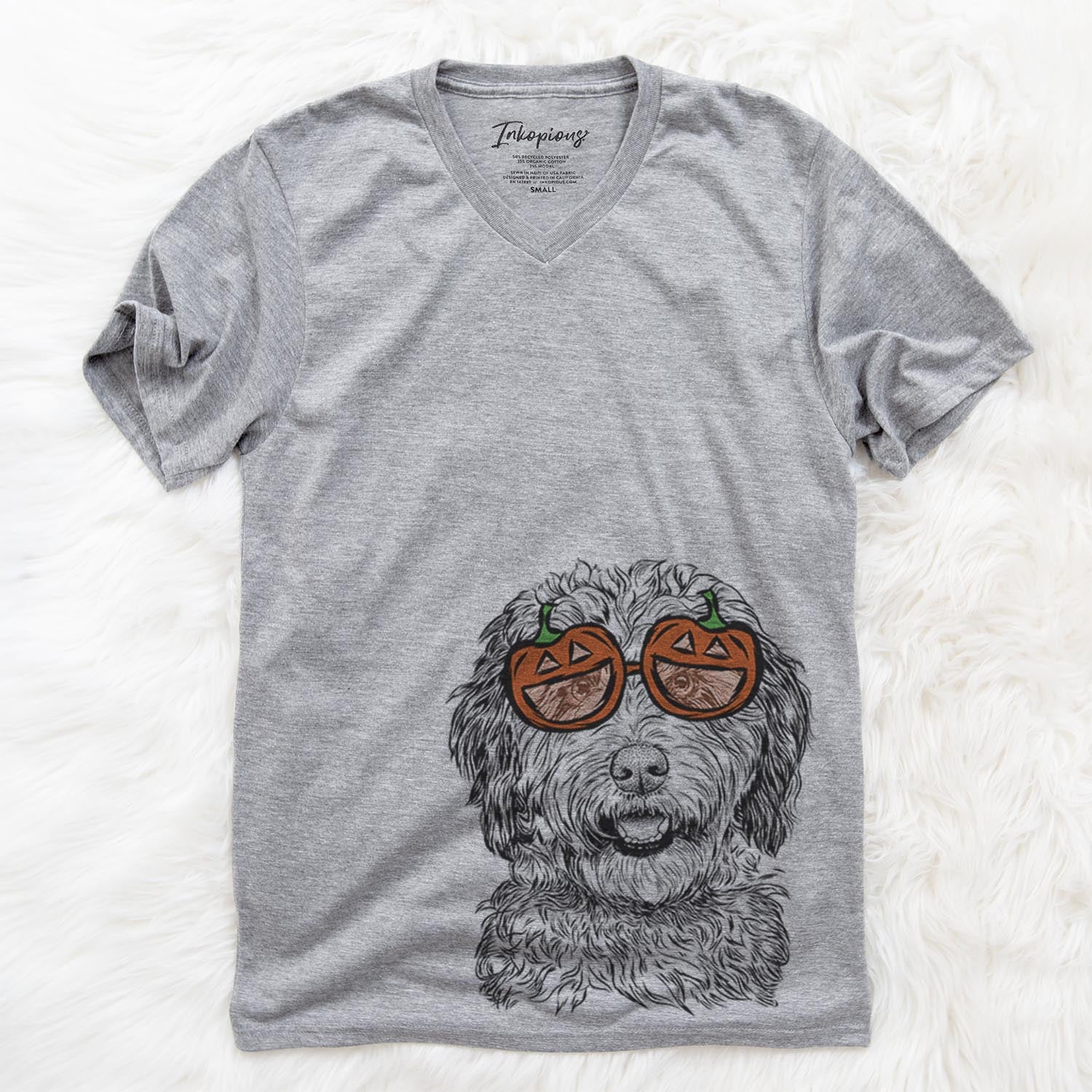 Hand-drawn sketch of Palmer the Aussiedoodle wearing pumpkin glasses on a Palmer Doodle pumpkin collection