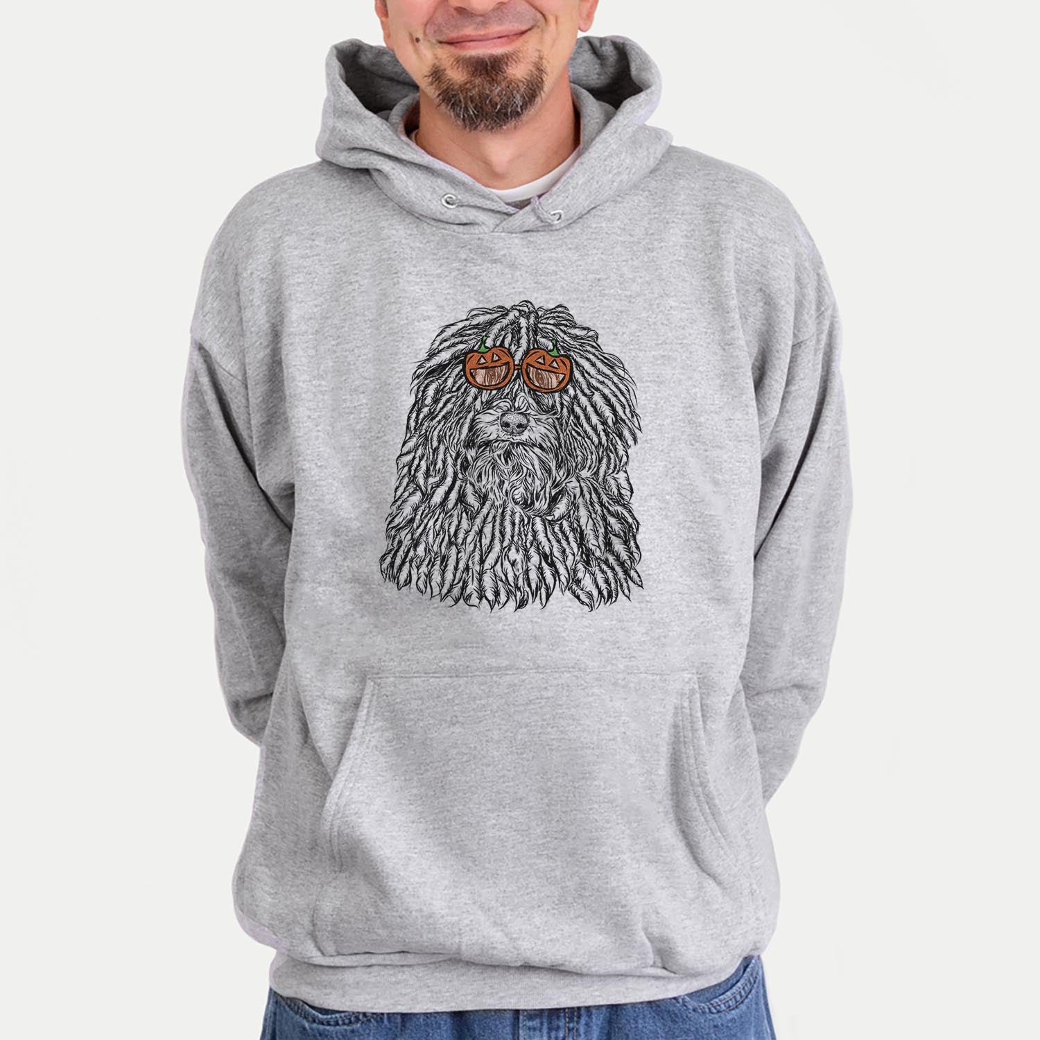 Hand-drawn sketch of Rezi the Puli wearing pumpkin glasses on a Grey pumpkin collection, hanging on a wall