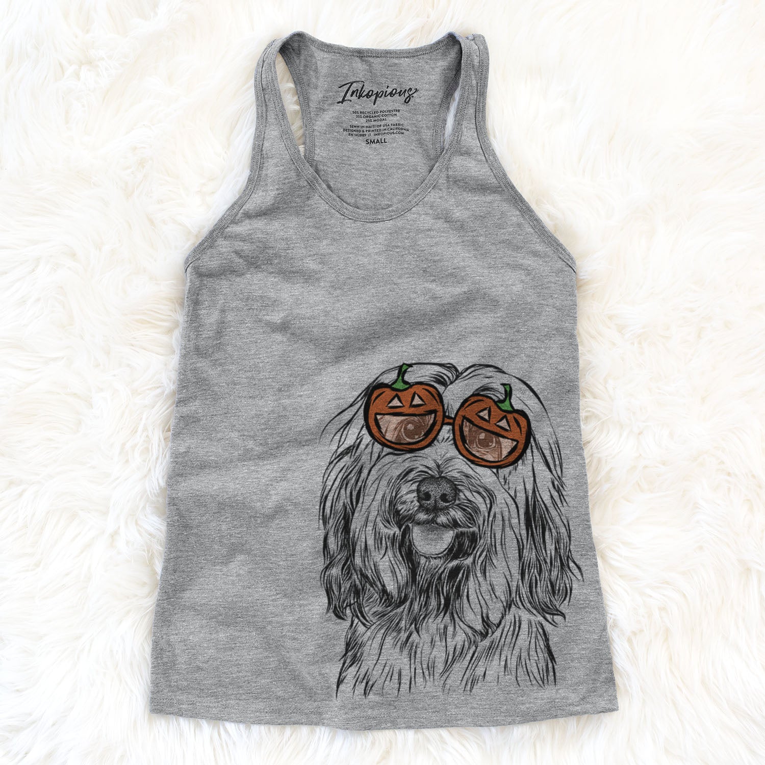 Hand-drawn sketch of Rime the Tibetan Terrier wearing pumpkin glasses on a Grey pumpkin collection
