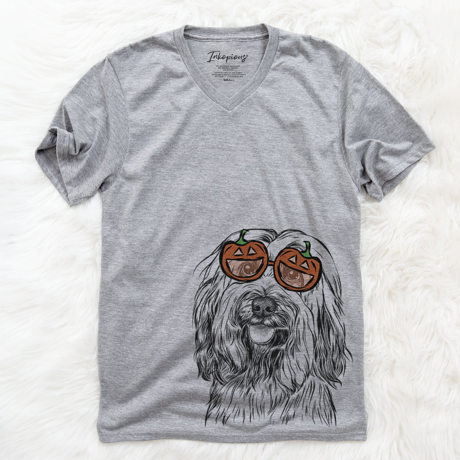 Hand-drawn sketch of Rime the Tibetan Terrier wearing pumpkin glasses on a Grey pumpkin collection