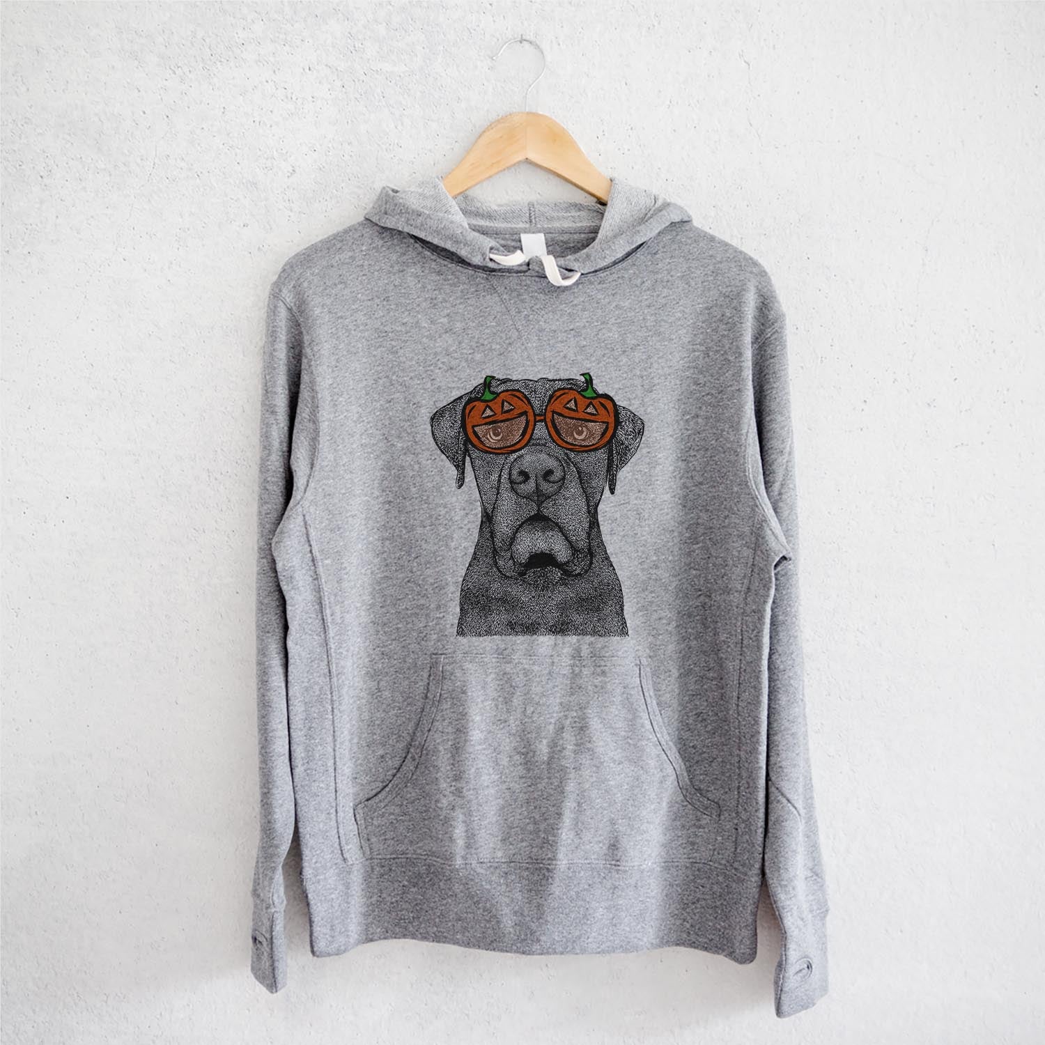Hand-drawn sketch of Rocco the Cane Corso wearing pumpkin glasses on a Grey pumpkin collection, on a hanger