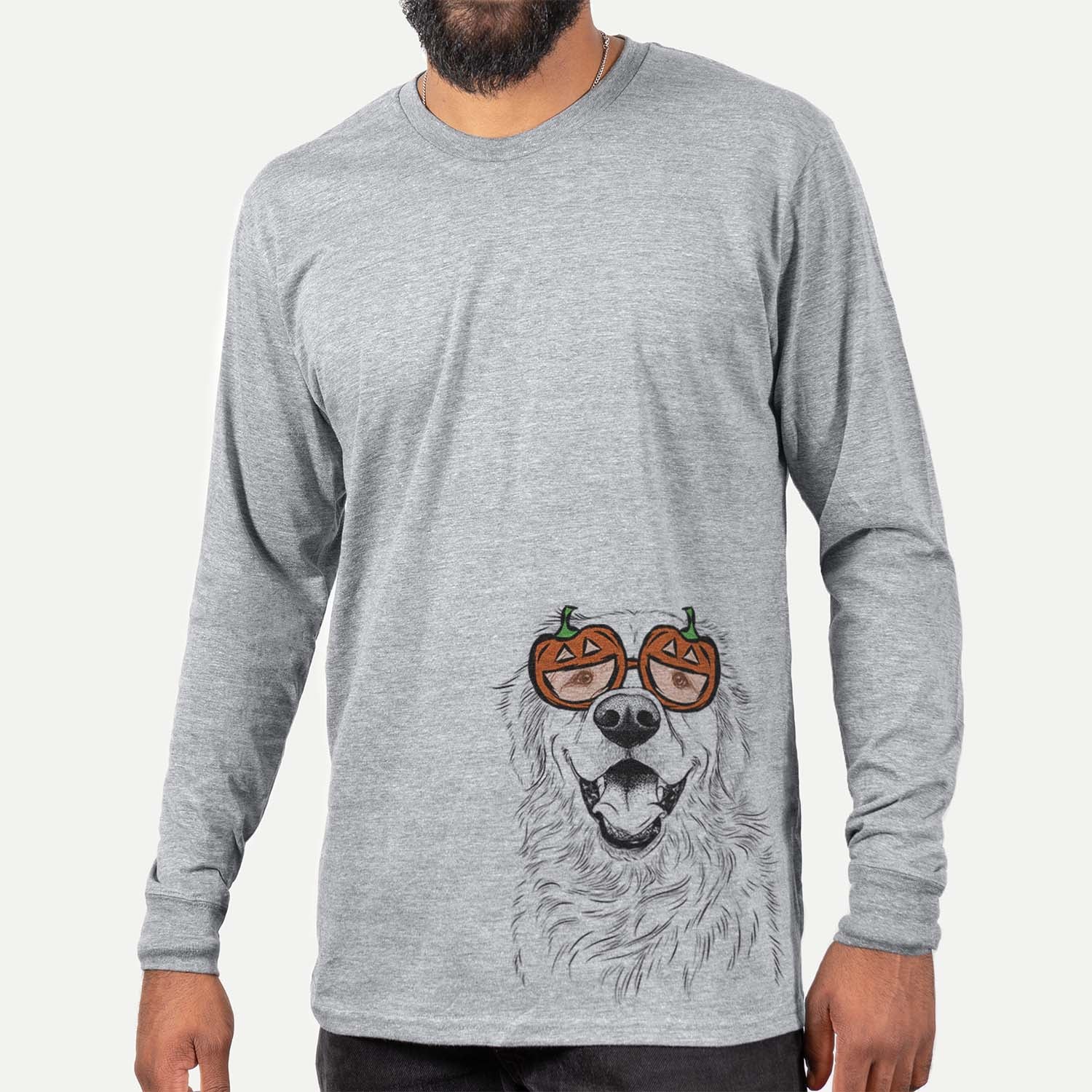 Hand-drawn sketch of Roger the Golden Retriever wearing pumpkin glasses on a Grey pumpkin collection, hanging on a wall