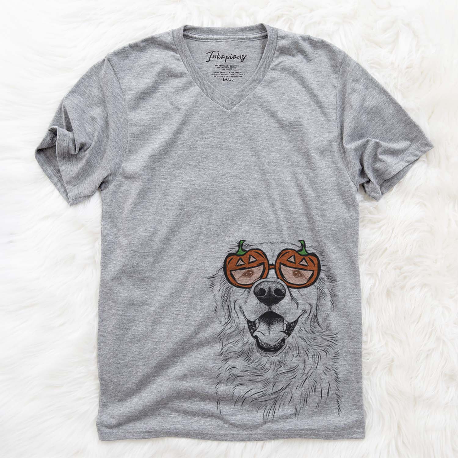 Hand-drawn sketch of Roger the Golden Retriever wearing pumpkin glasses on a Grey pumpkin collection