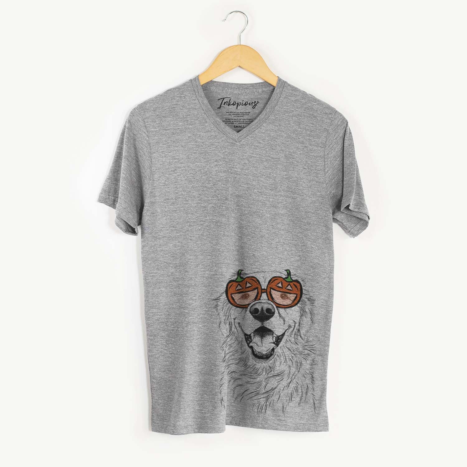 Hand-drawn sketch of Roger the Golden Retriever wearing pumpkin glasses on a Grey pumpkin collection