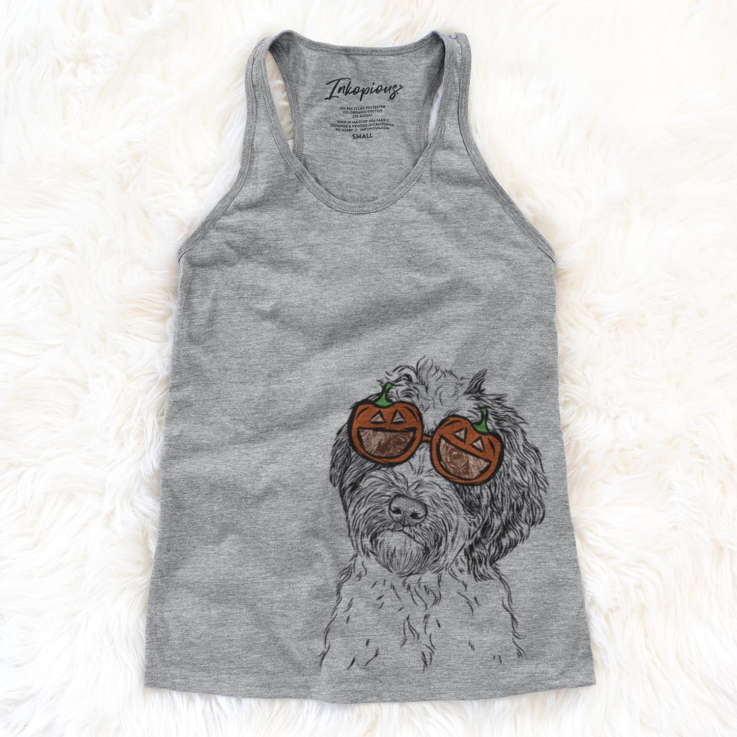 Hand-drawn sketch of Rooney the Aussiedoodle wearing pumpkin glasses on a Rooney Doodle pumpkin collection