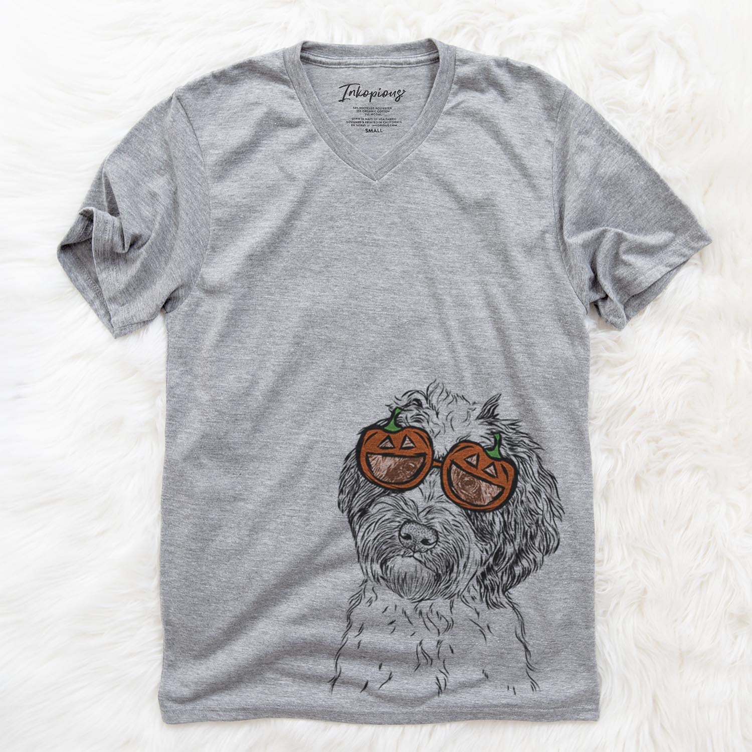 Hand-drawn sketch of Rooney the Aussiedoodle wearing pumpkin glasses on a Rooney Doodle pumpkin collection