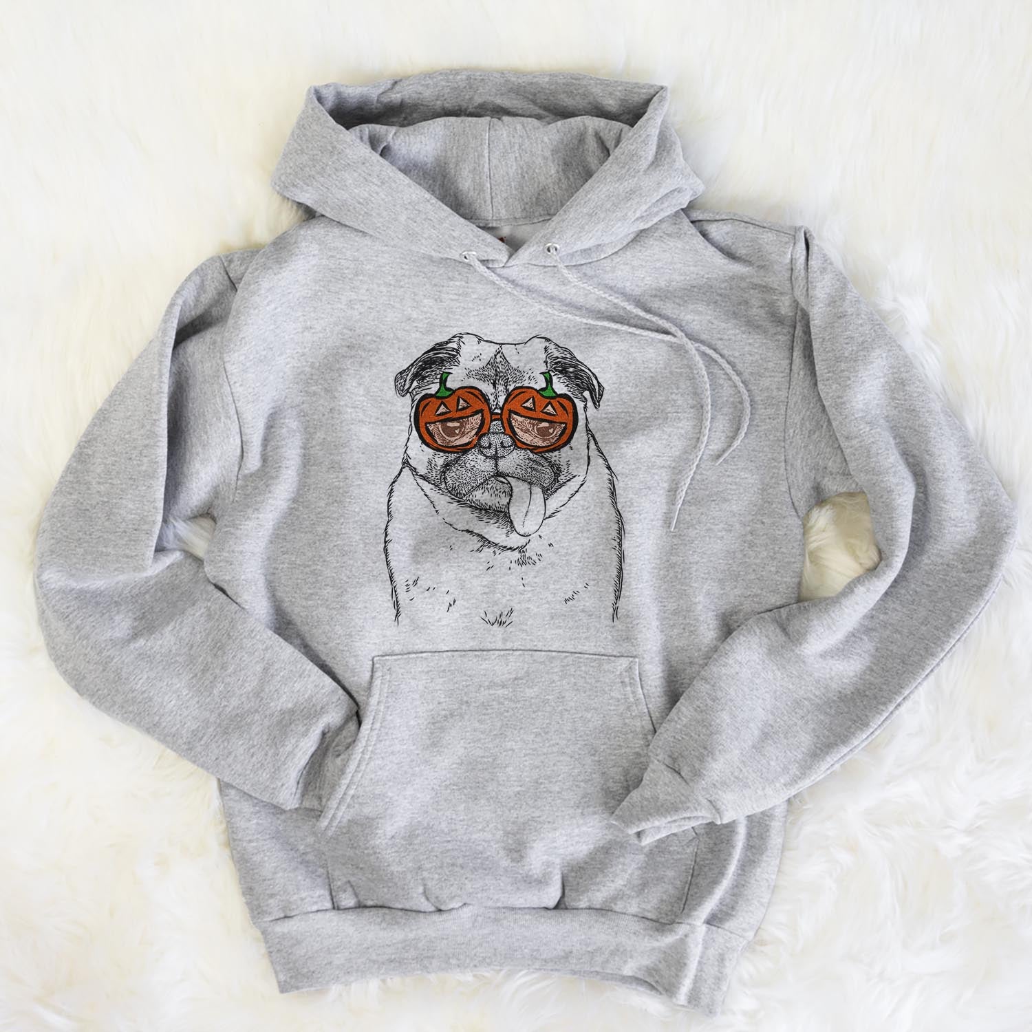 Hand-drawn sketch of Rosie the Pug wearing pumpkin glasses on a Grey pumpkin collection, flat lay