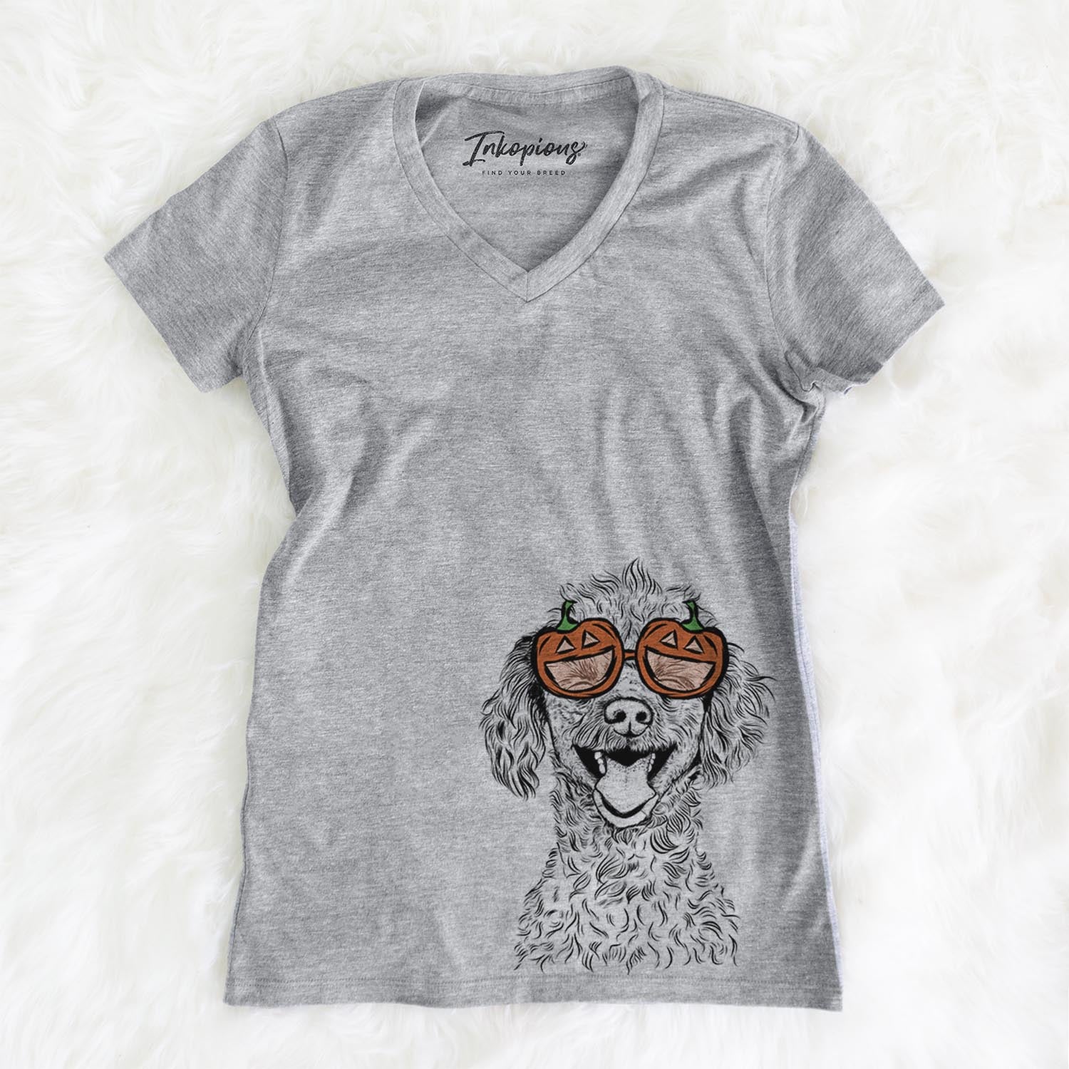 Hand-drawn sketch of Rusty the Toy Poodle wearing pumpkin glasses on a Grey pumpkin collection, on a hanger
