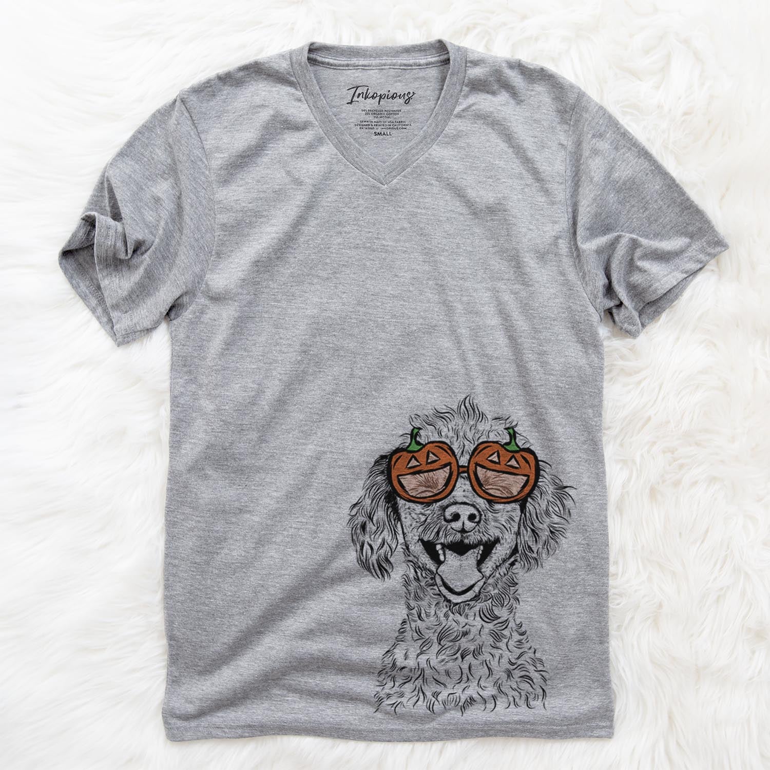 Hand-drawn sketch of Rusty the Toy Poodle wearing pumpkin glasses on a Grey pumpkin collection
