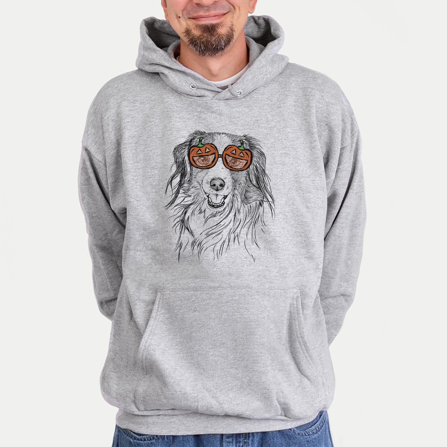 Hand-drawn sketch of Rutger the Nederlandse Kooikerhondje wearing pumpkin glasses on a Grey pumpkin collection, hanging on a wall