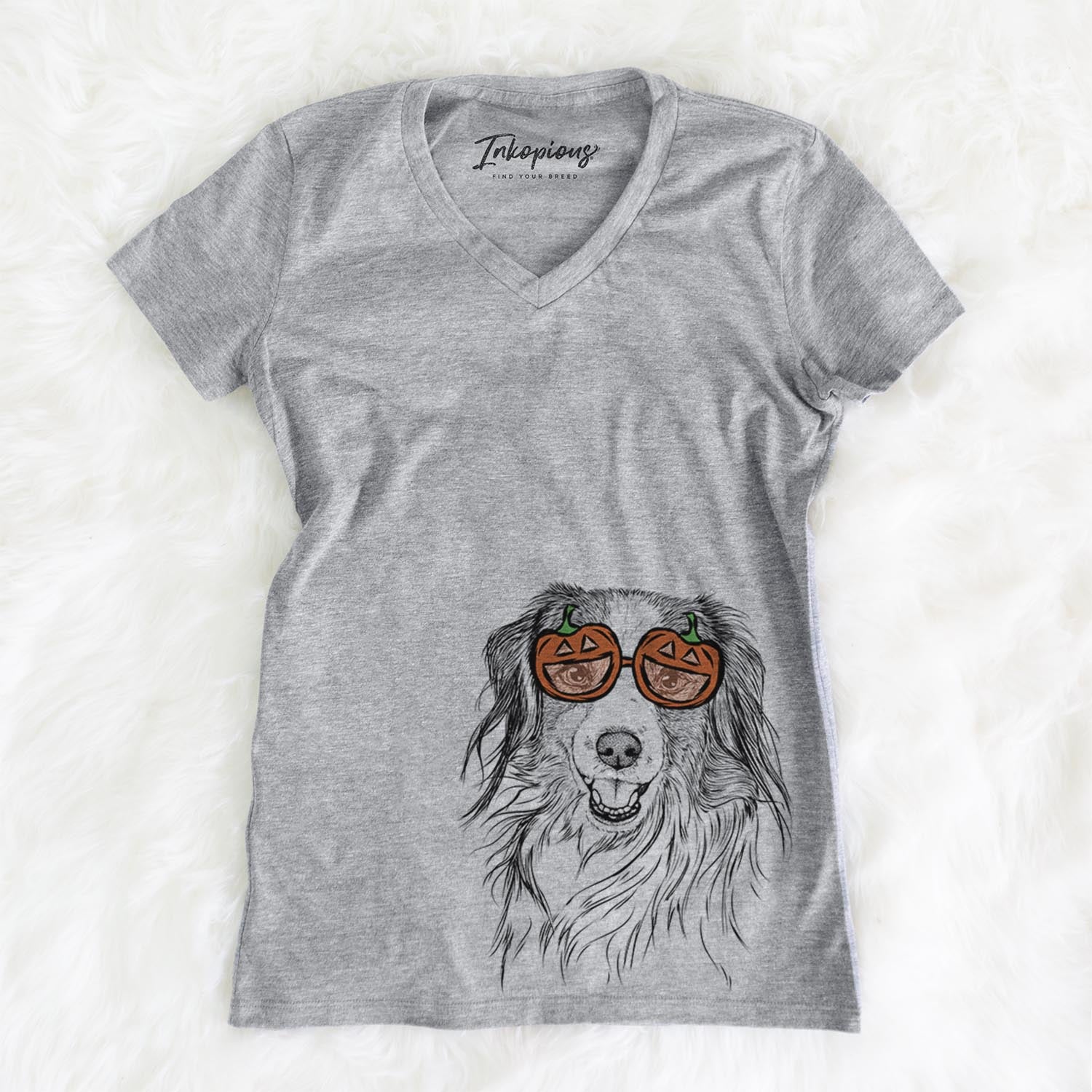 Hand-drawn sketch of Rutger the Nederlandse Kooikerhondje wearing pumpkin glasses on a Grey pumpkin collection, on a hanger