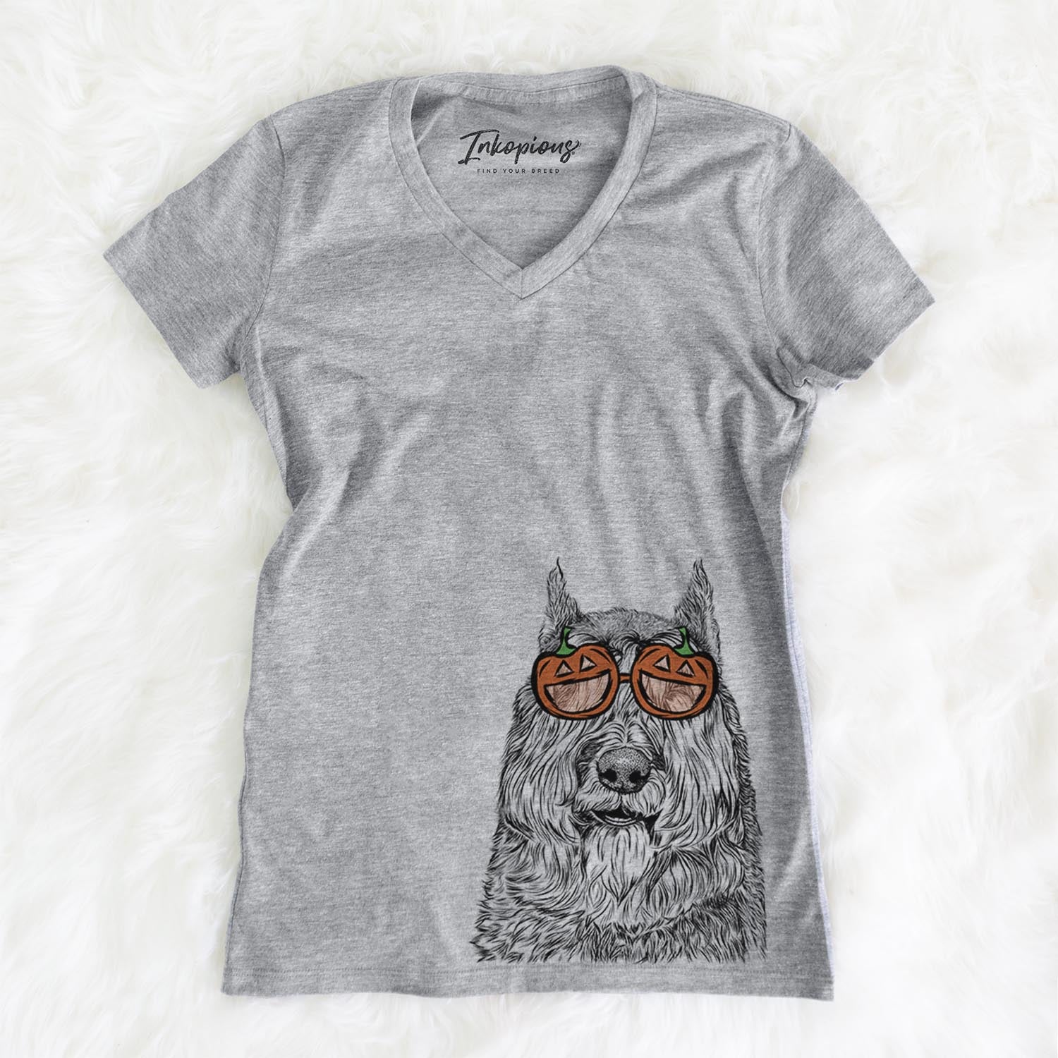Hand-drawn sketch of Sabre the Bouvier des Flandres wearing pumpkin glasses on a Grey pumpkin collection, on a hanger