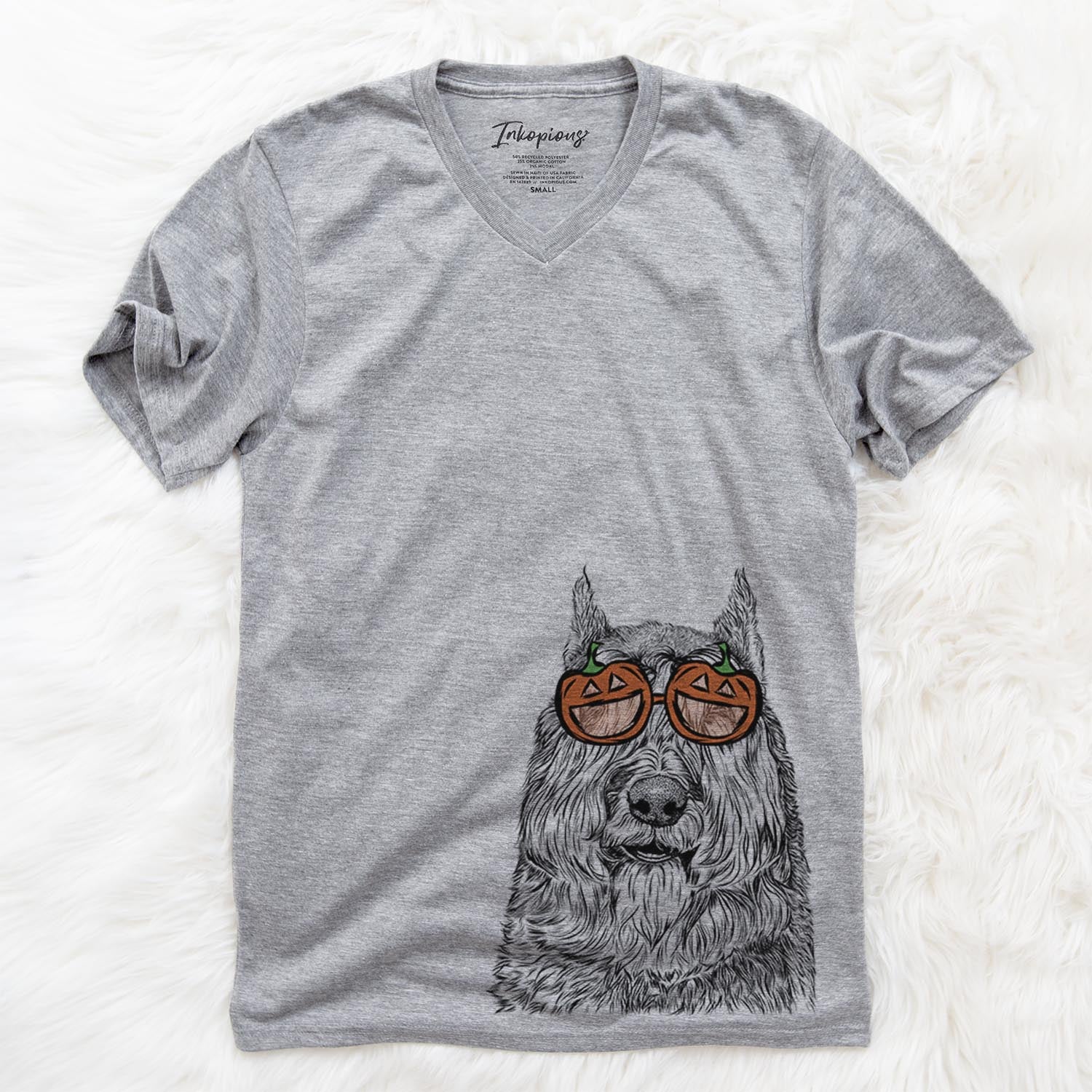 Hand-drawn sketch of Sabre the Bouvier des Flandres wearing pumpkin glasses on a Grey pumpkin collection