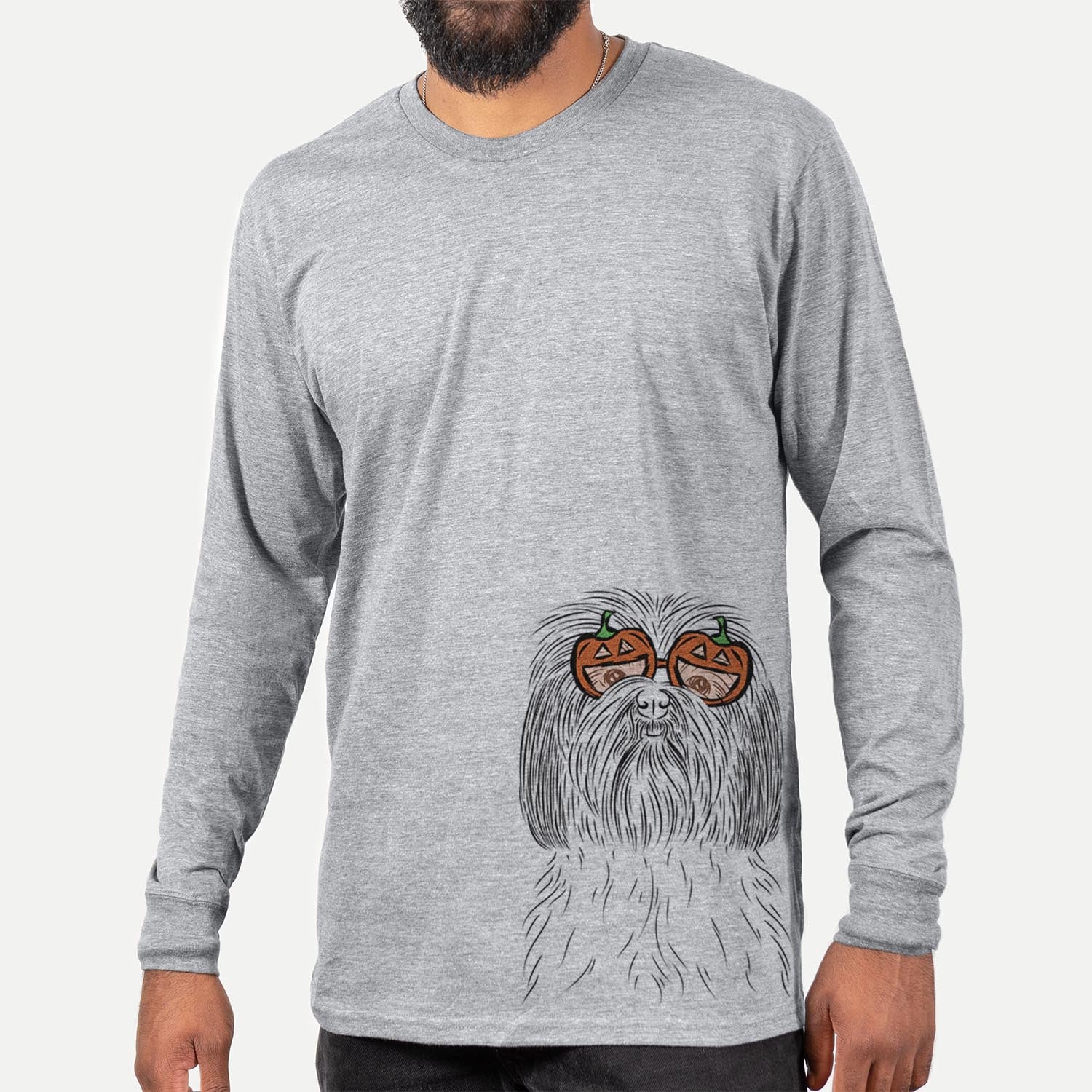 Hand-drawn sketch of Scully the Shih Tzu wearing pumpkin glasses on a Grey pumpkin collection, hanging on a wall