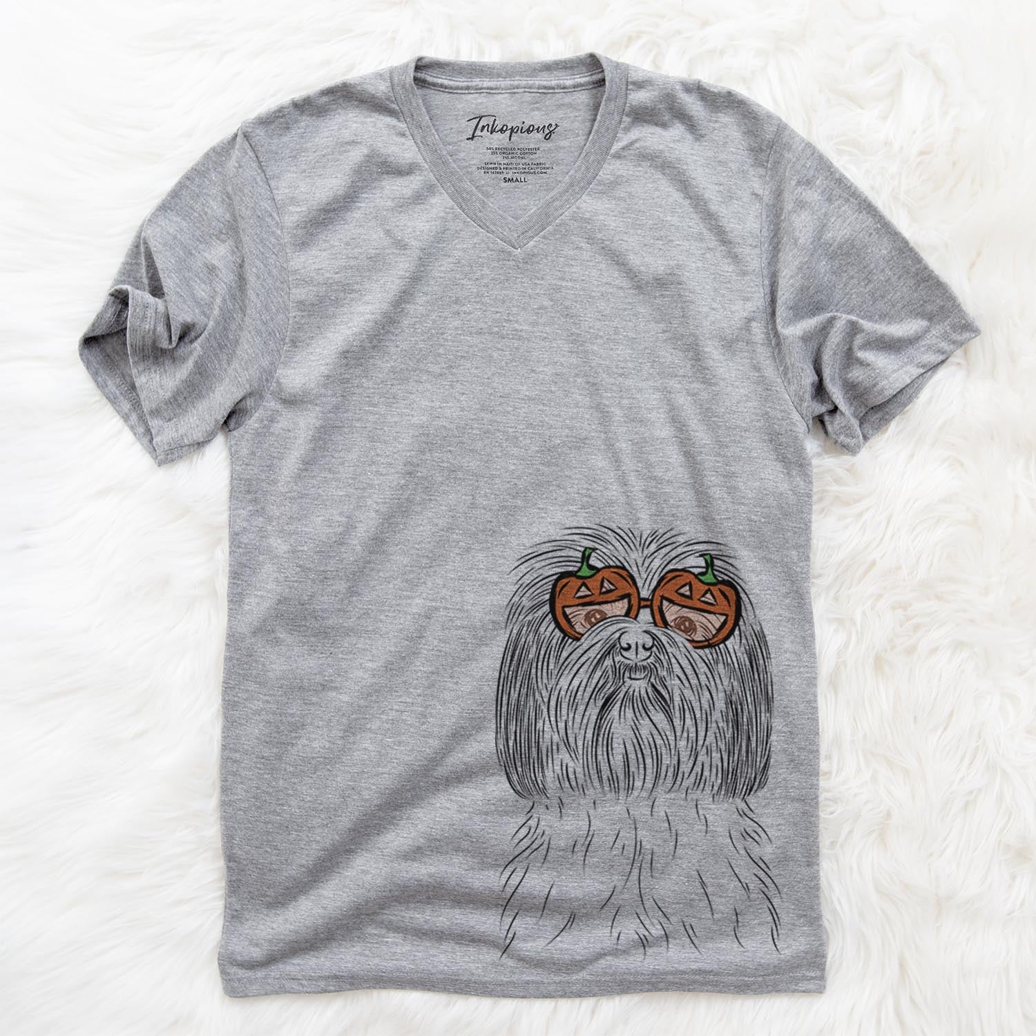Hand-drawn sketch of Scully the Shih Tzu wearing pumpkin glasses on a Grey pumpkin collection