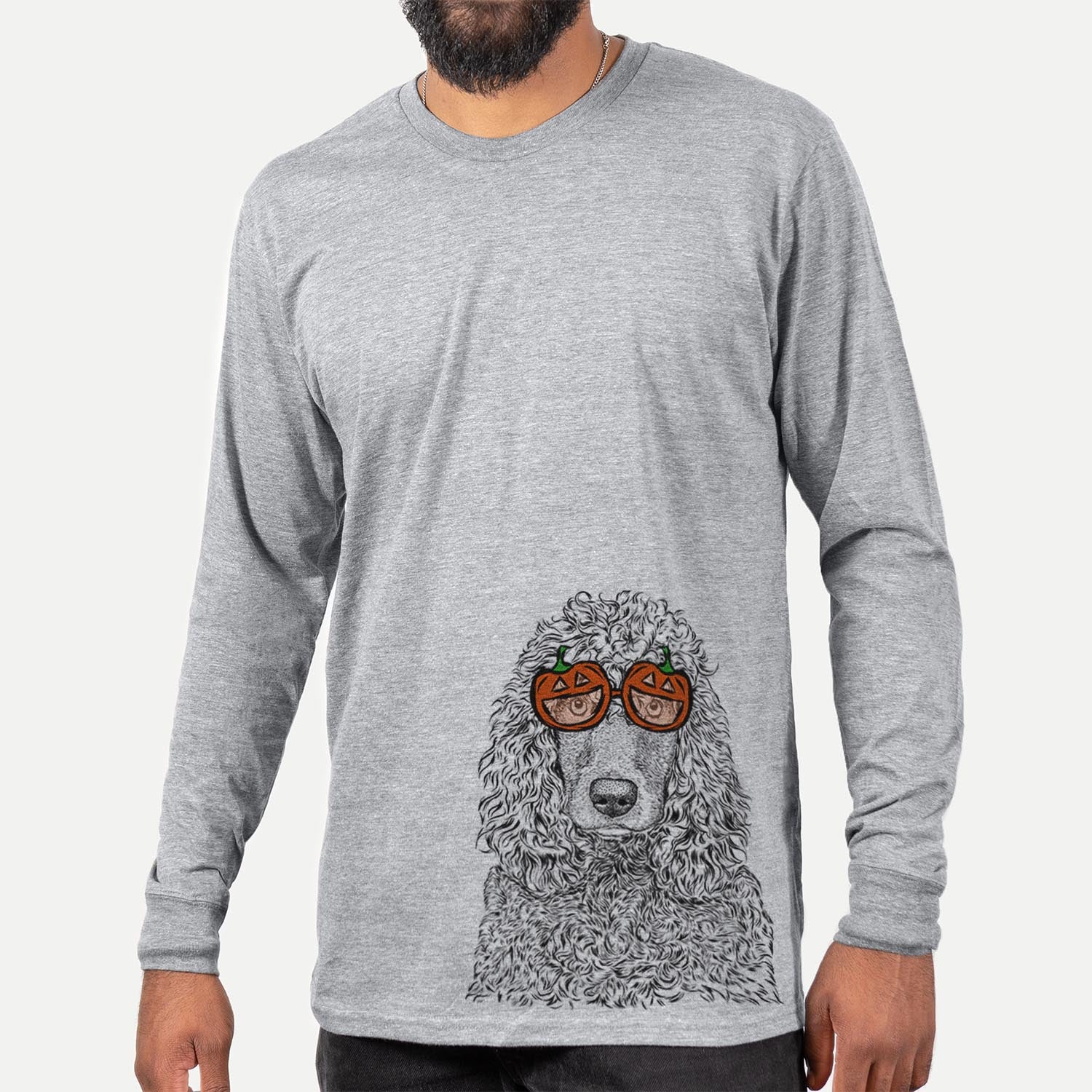 Hand-drawn sketch of Shilo the Irish Water Spaniel wearing pumpkin glasses on a Grey pumpkin collection, hanging on a wall