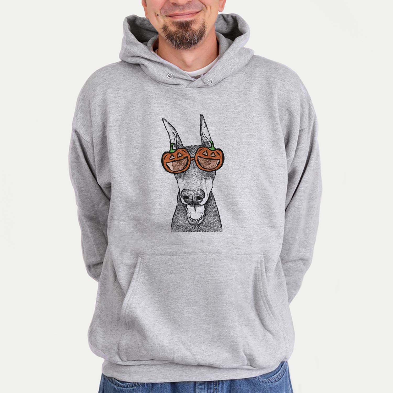 Hand-drawn sketch of Sir Duke the Doberman Pinscher wearing pumpkin glasses on a Grey pumpkin collection, hanging on a wall