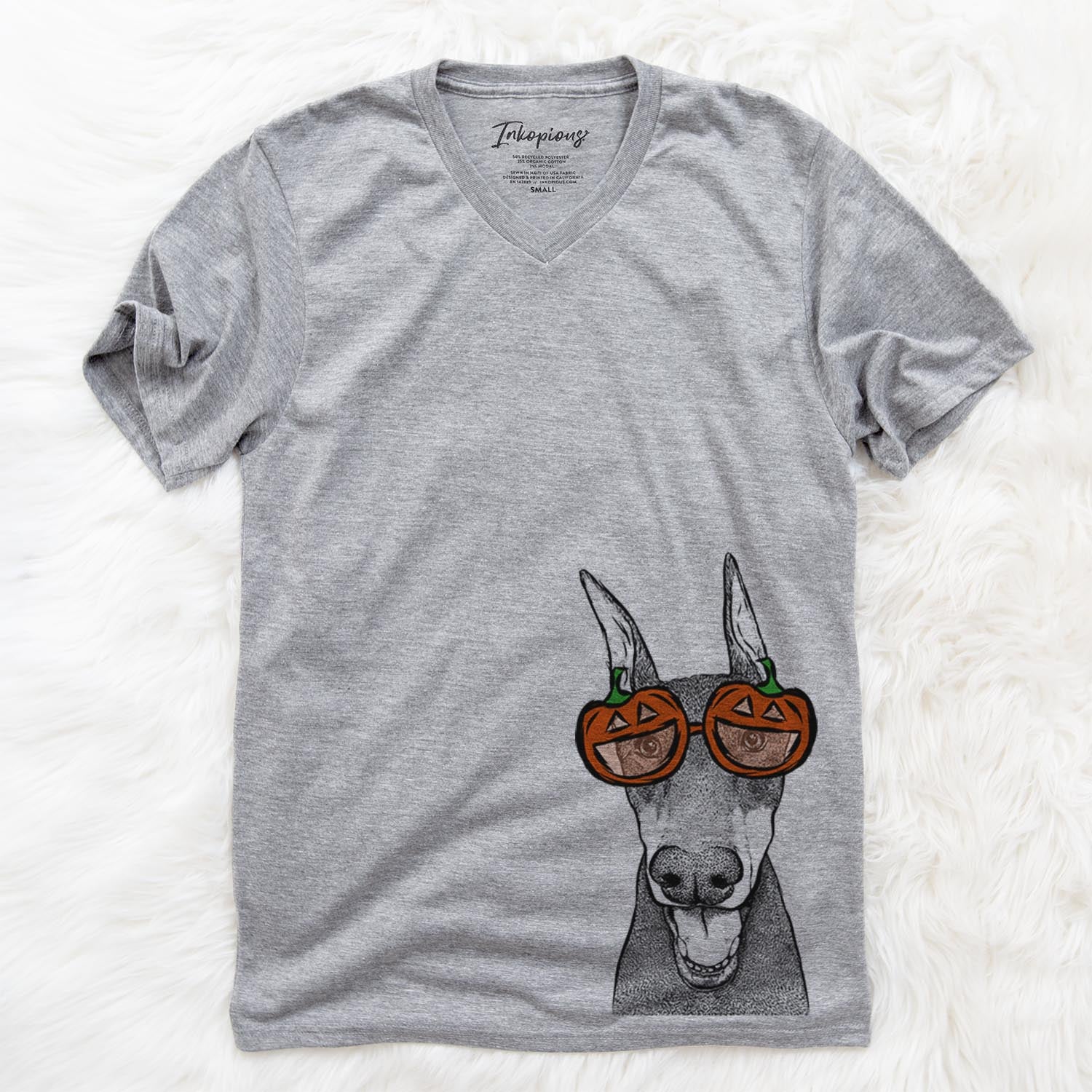 Hand-drawn sketch of Sir Duke the Doberman Pinscher wearing pumpkin glasses on a Grey pumpkin collection