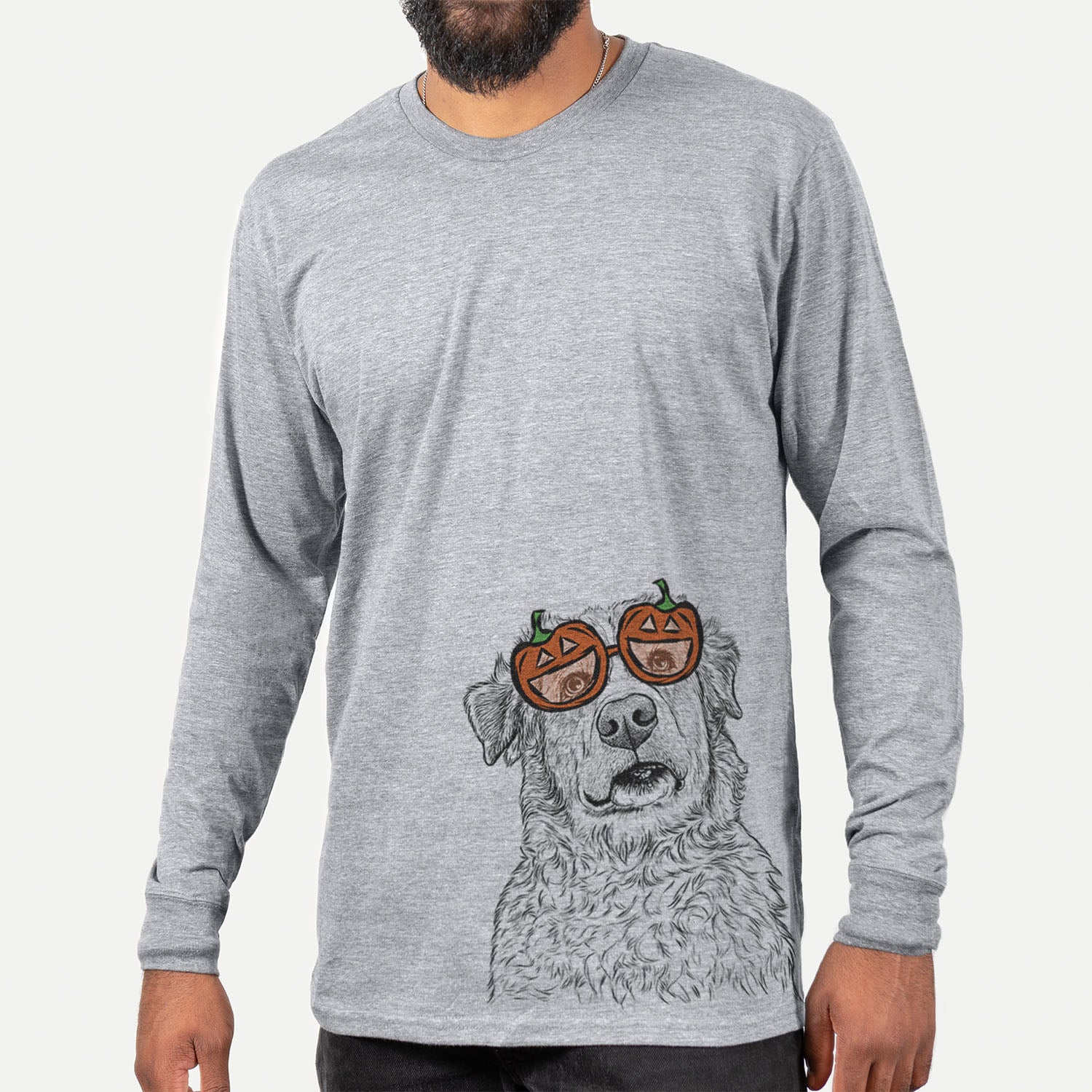 Hand-drawn sketch of Smokey Jam the Middle Eastern Village Dog wearing pumpkin glasses on a Grey pumpkin collection, hanging on a wall