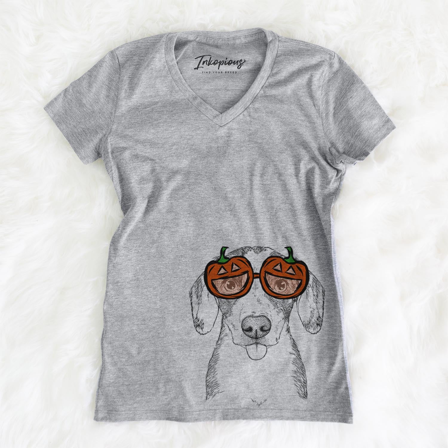 Hand-drawn sketch of SophiePea the Mixed Breed wearing pumpkin glasses on a Grey pumpkin collection, on a hanger