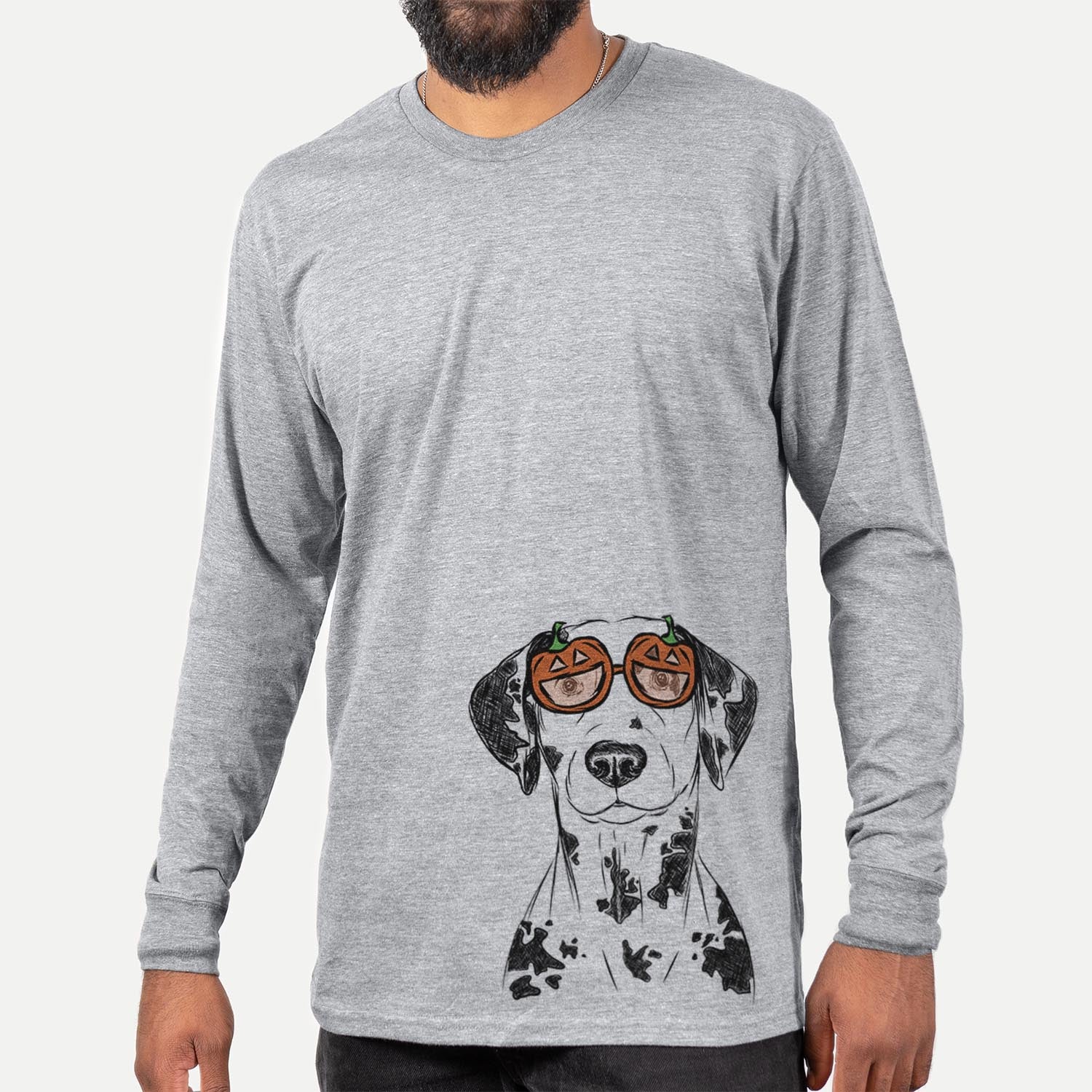 Hand-drawn sketch of Spot the Dalmatian wearing pumpkin glasses on a Grey pumpkin collection, hanging on a wall