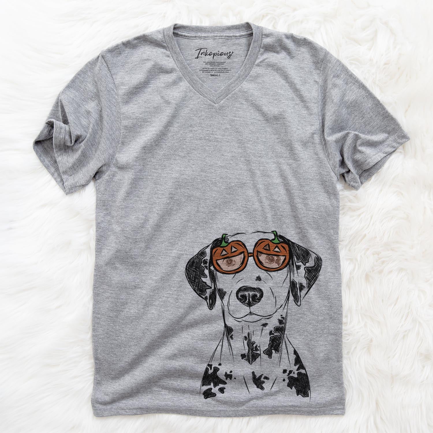 Hand-drawn sketch of Spot the Dalmatian wearing pumpkin glasses on a Grey pumpkin collection