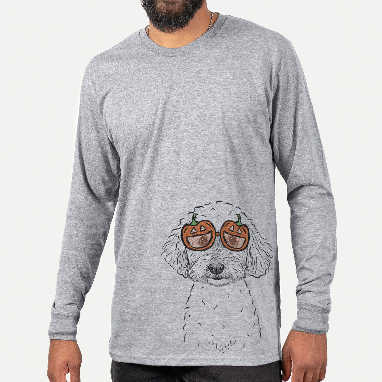 Hand-drawn sketch of Stitch the Bichonpoo wearing pumpkin glasses on a Grey pumpkin collection, hanging on a wall
