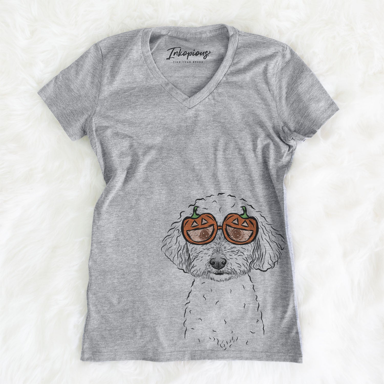 Hand-drawn sketch of Stitch the Bichonpoo wearing pumpkin glasses on a Grey pumpkin collection, on a hanger
