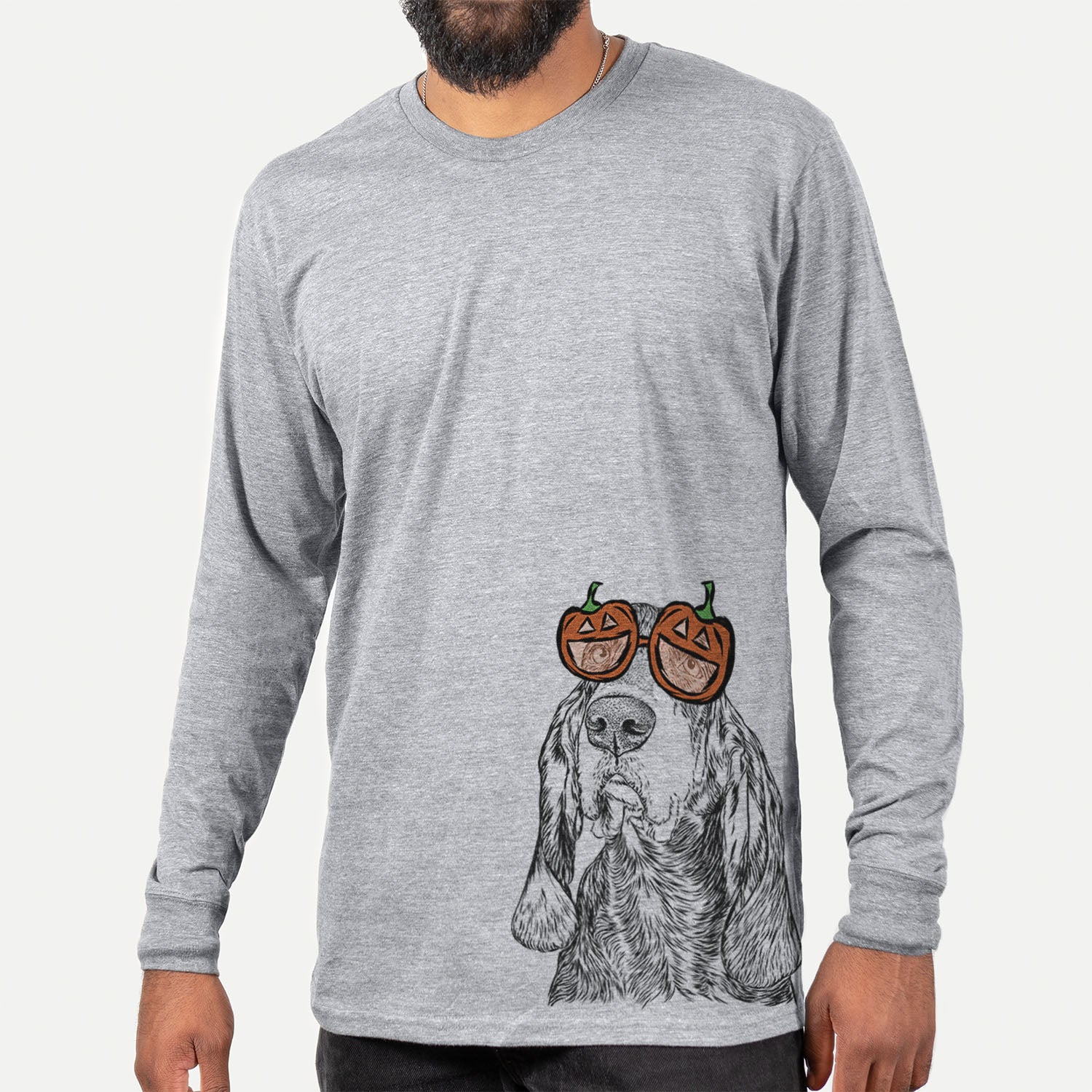 Hand-drawn sketch of Stu the Black and Tan Coonhound wearing pumpkin glasses on a Grey pumpkin collection, hanging on a wall
