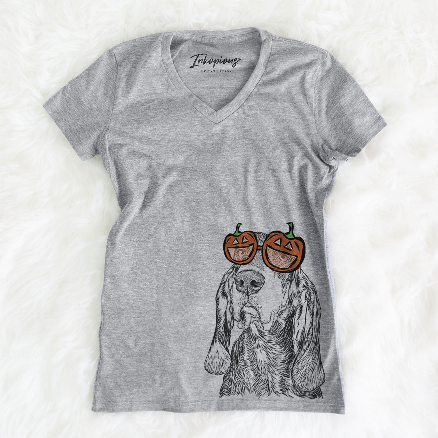 Hand-drawn sketch of Stu the Black and Tan Coonhound wearing pumpkin glasses on a Grey pumpkin collection, on a hanger