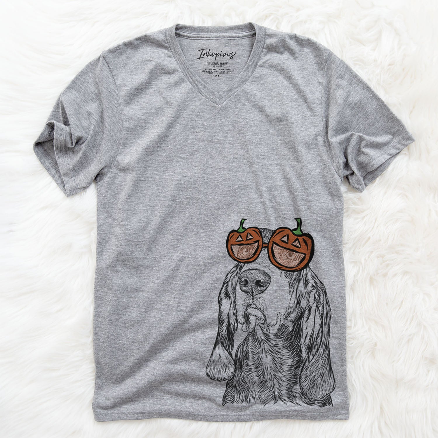 Hand-drawn sketch of Stu the Black and Tan Coonhound wearing pumpkin glasses on a Grey pumpkin collection