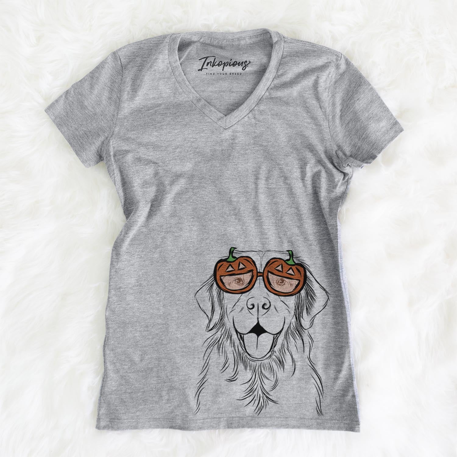 Hand-drawn sketch of Sunny the Golden Retriever wearing pumpkin glasses on a Grey pumpkin collection, on a hanger
