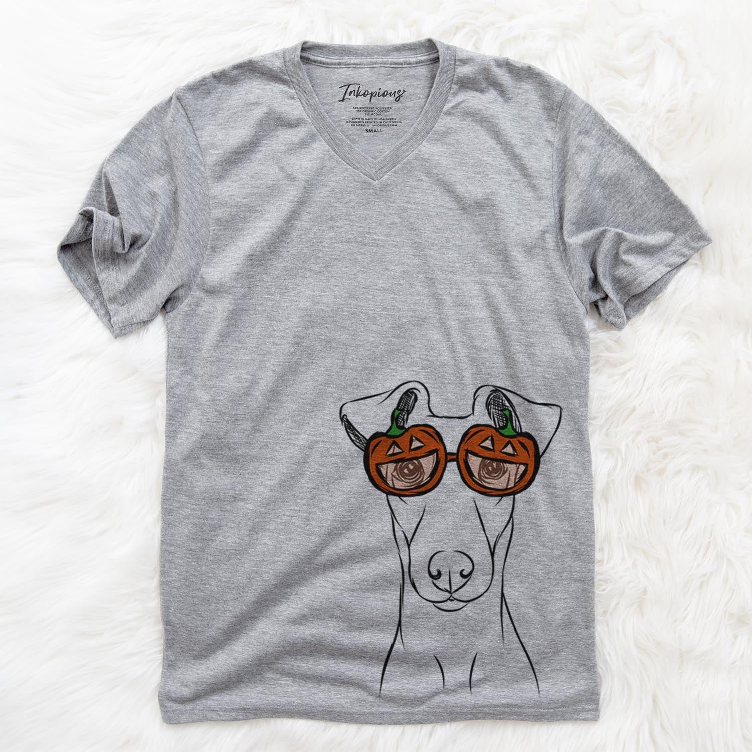 Hand-drawn sketch of Tanner the Fox Terrier wearing pumpkin glasses on a Grey pumpkin collection