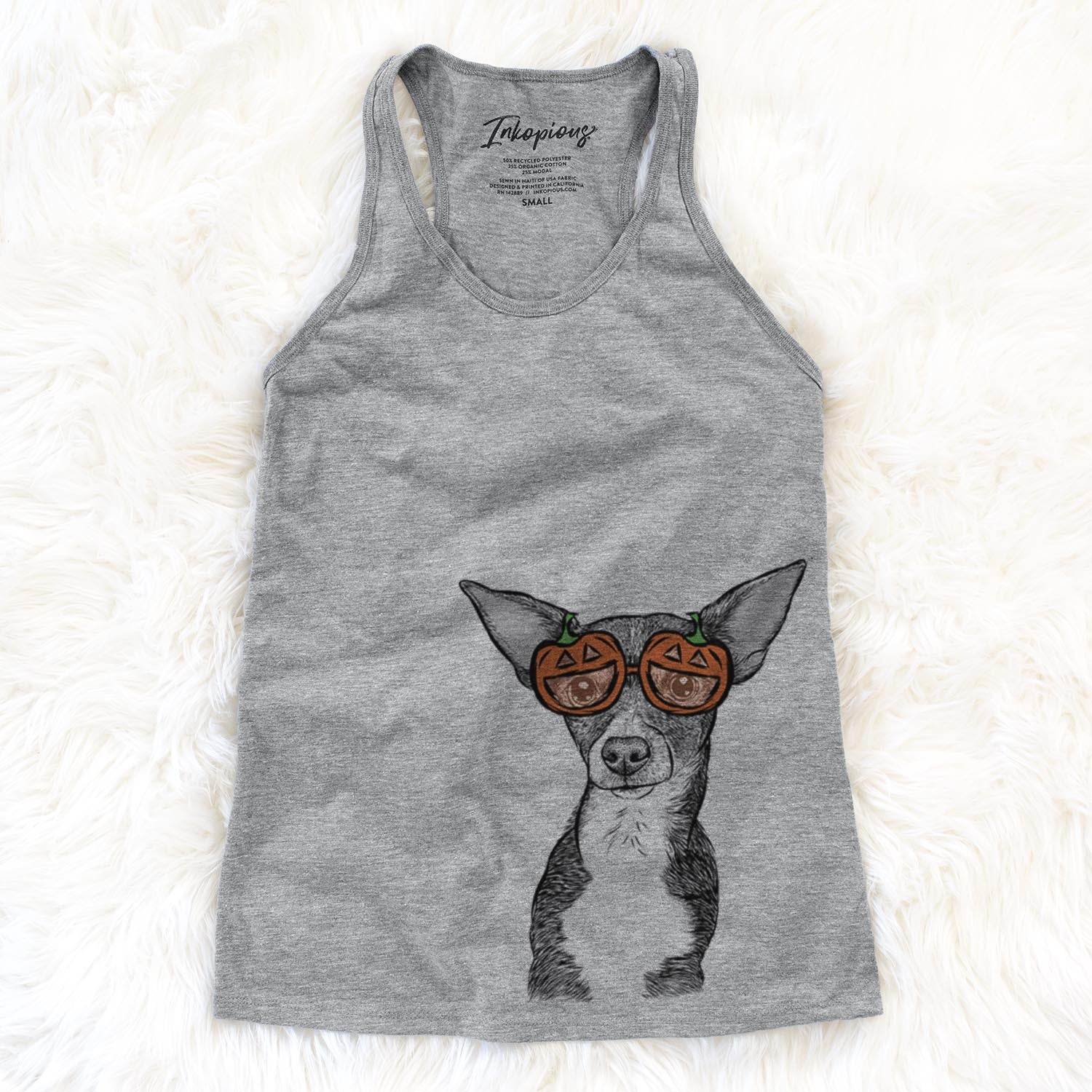 Hand-drawn sketch of Tiny Archie the Mixed Breed wearing pumpkin glasses on a Grey pumpkin collection