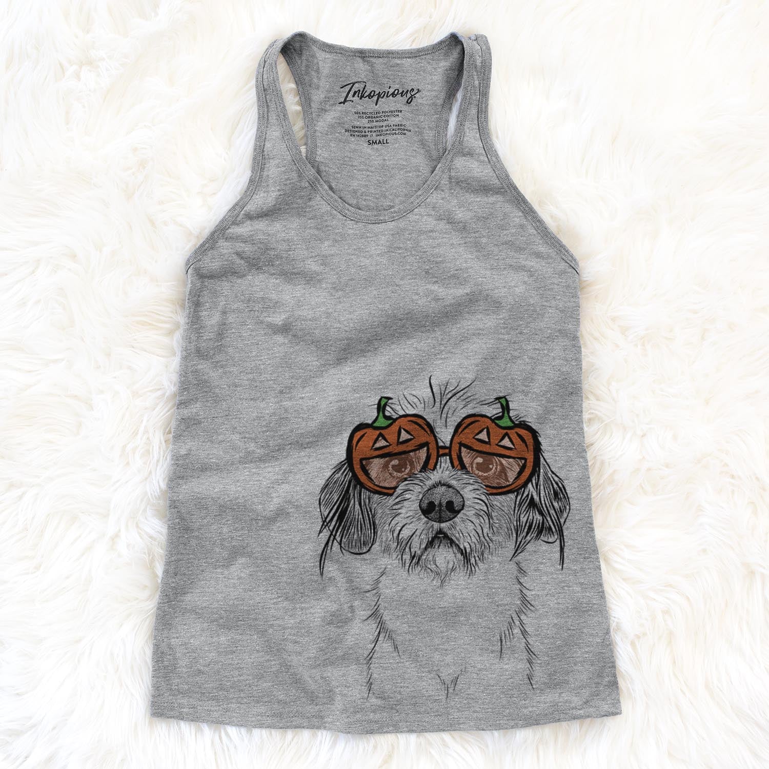 Hand-drawn sketch of Tiny Tucker the Mixed Breed wearing pumpkin glasses on a Grey pumpkin collection