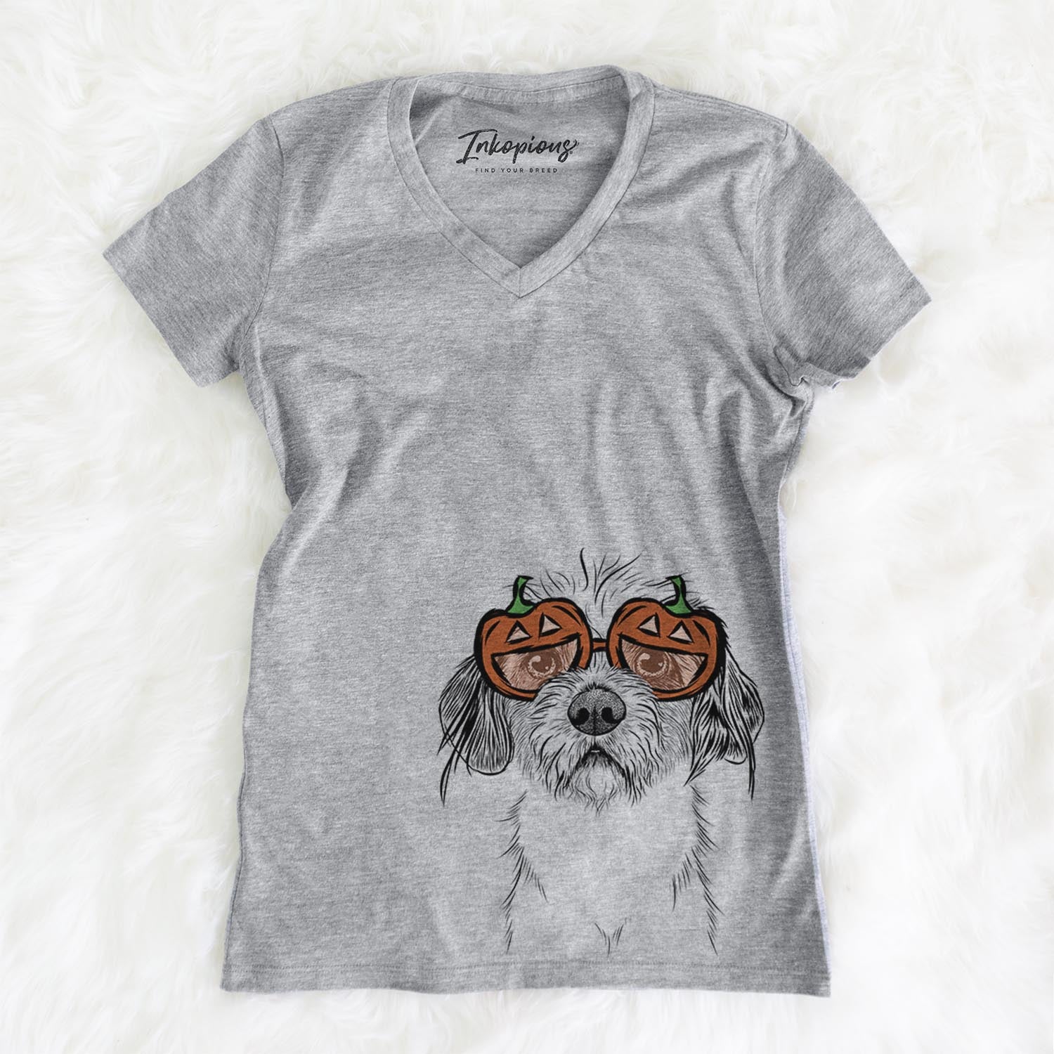 Hand-drawn sketch of Tiny Tucker the Mixed Breed wearing pumpkin glasses on a Grey pumpkin collection, on a hanger
