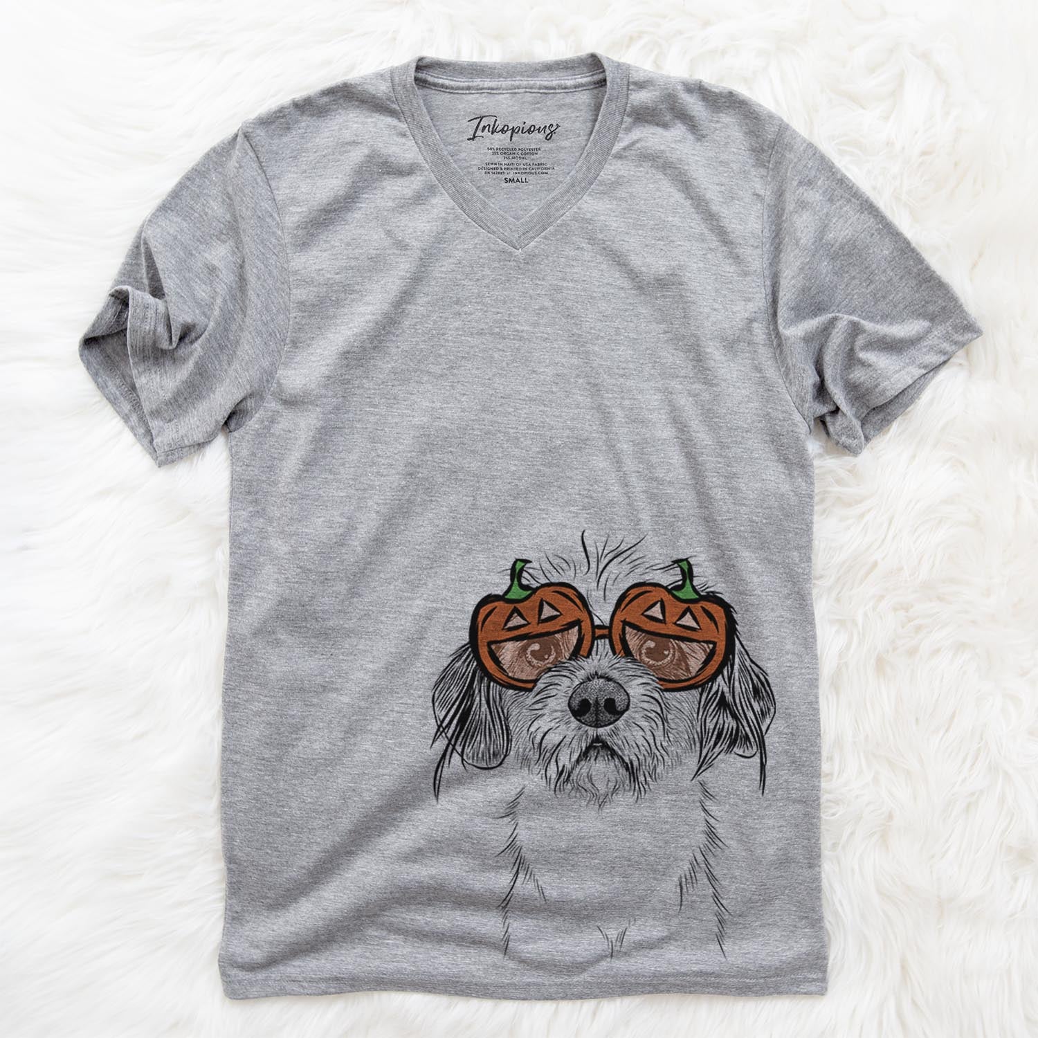 Hand-drawn sketch of Tiny Tucker the Mixed Breed wearing pumpkin glasses on a Grey pumpkin collection