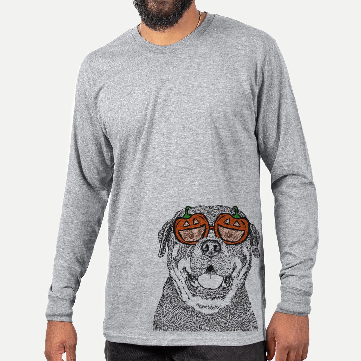 Hand-drawn sketch of Titan the Rottweiler wearing pumpkin glasses on a Grey pumpkin collection, hanging on a wall