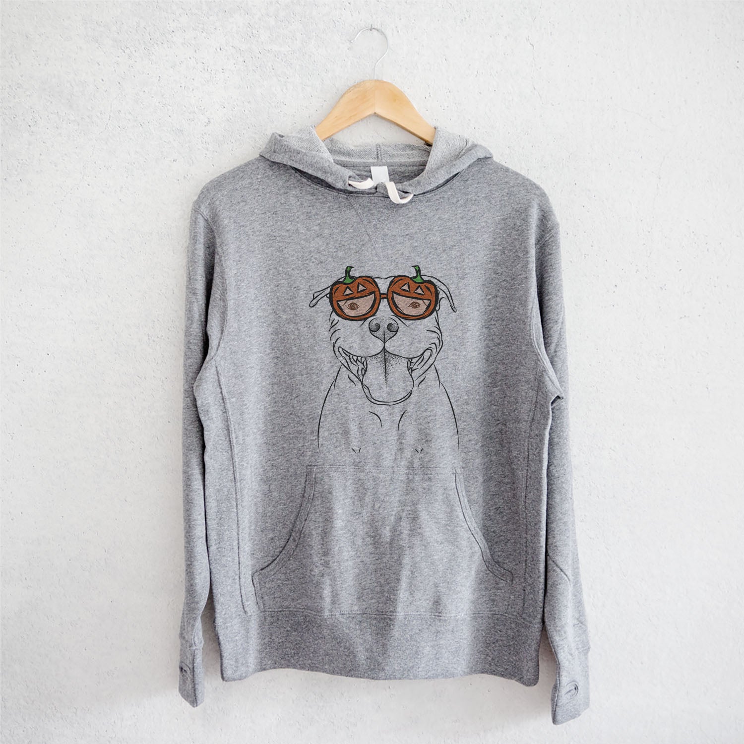 Hand-drawn sketch of Wafer the Staffordshire Bull Terrier wearing pumpkin glasses on a Grey pumpkin collection, on a hanger