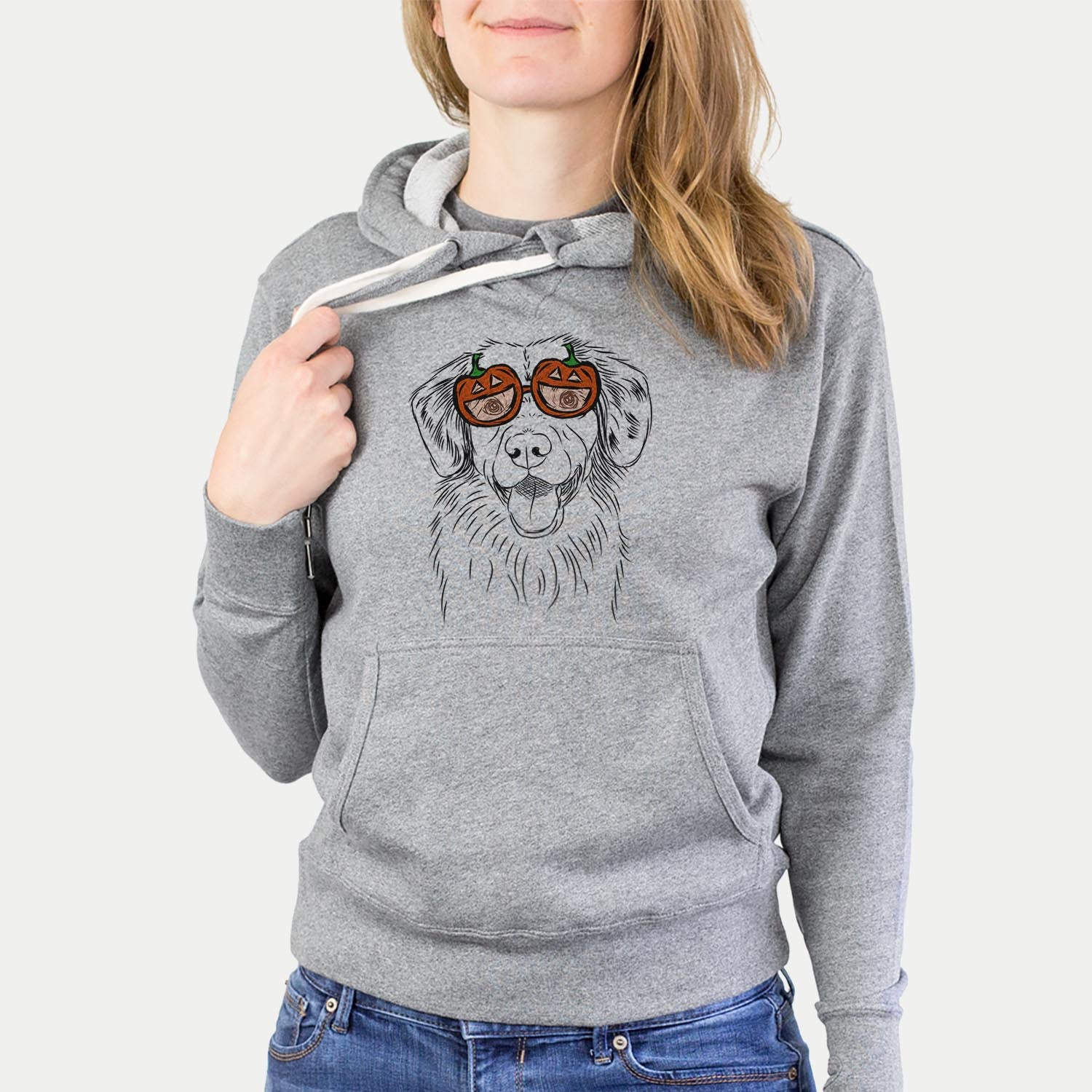 Hand-drawn sketch of Weston the Nova Scotia Duck Tolling Retriever wearing pumpkin glasses on a Grey pumpkin collection, hanging on a wall