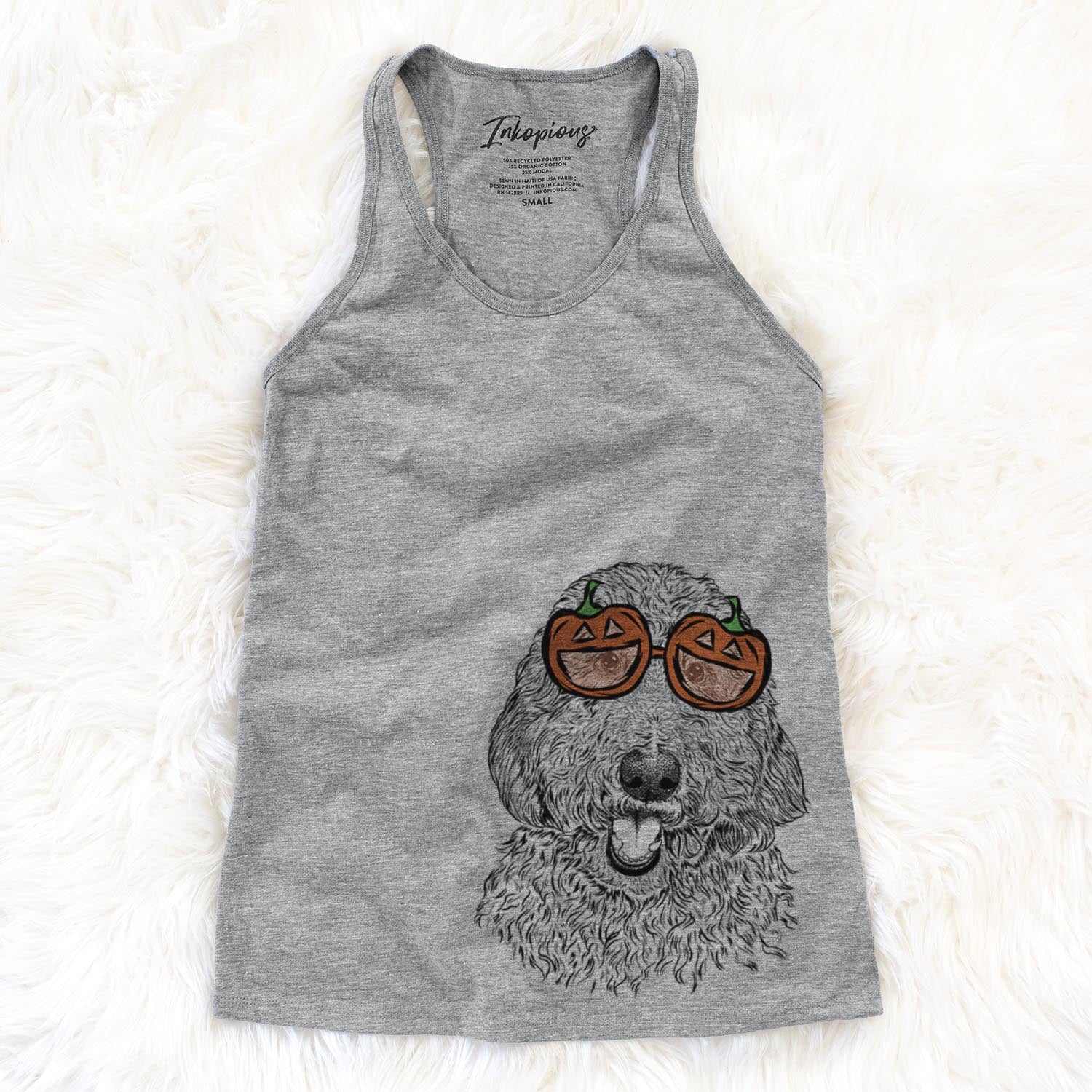 Hand-drawn sketch of Whisper the Goldendoodle wearing pumpkin glasses on a Grey pumpkin collection