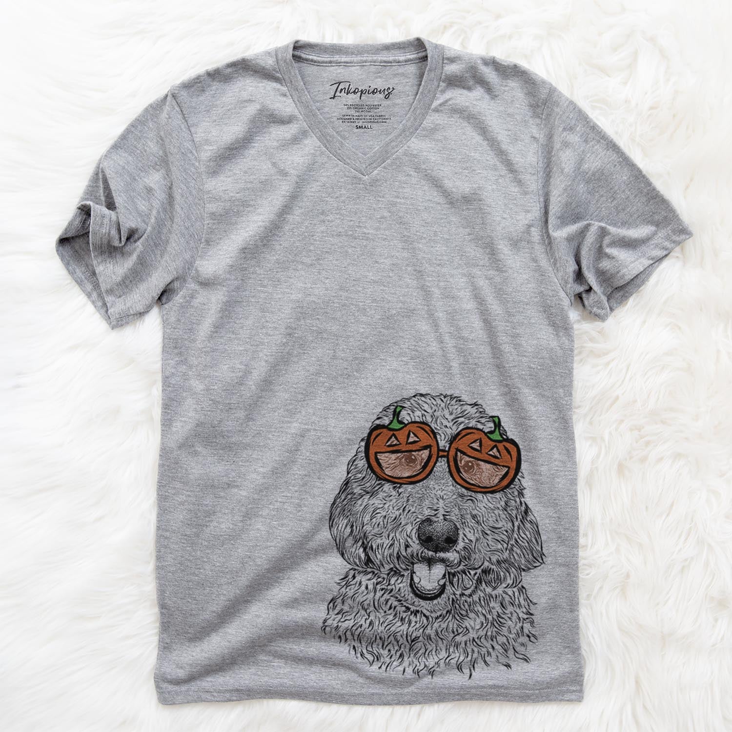 Hand-drawn sketch of Whisper the Goldendoodle wearing pumpkin glasses on a Grey pumpkin collection