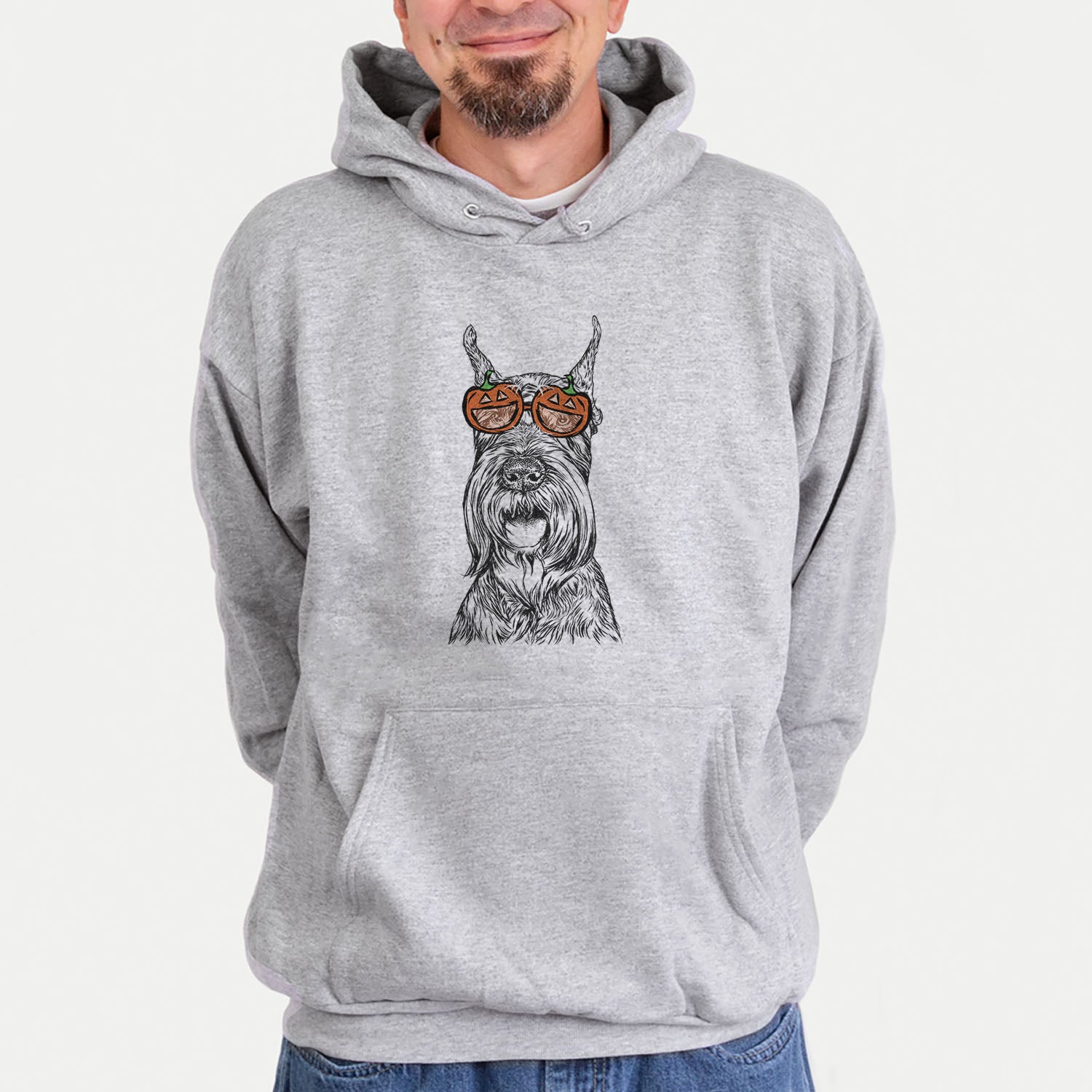 Hand-drawn sketch of Zuri the Giant Schnauzer wearing pumpkin glasses on a Grey pumpkin collection, hanging on a wall