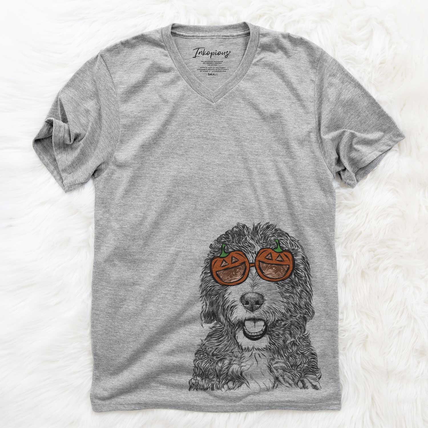 Hand-drawn sketch of Bash the Bernedoodle wearing pumpkin glasses on a Grey pumpkin collection