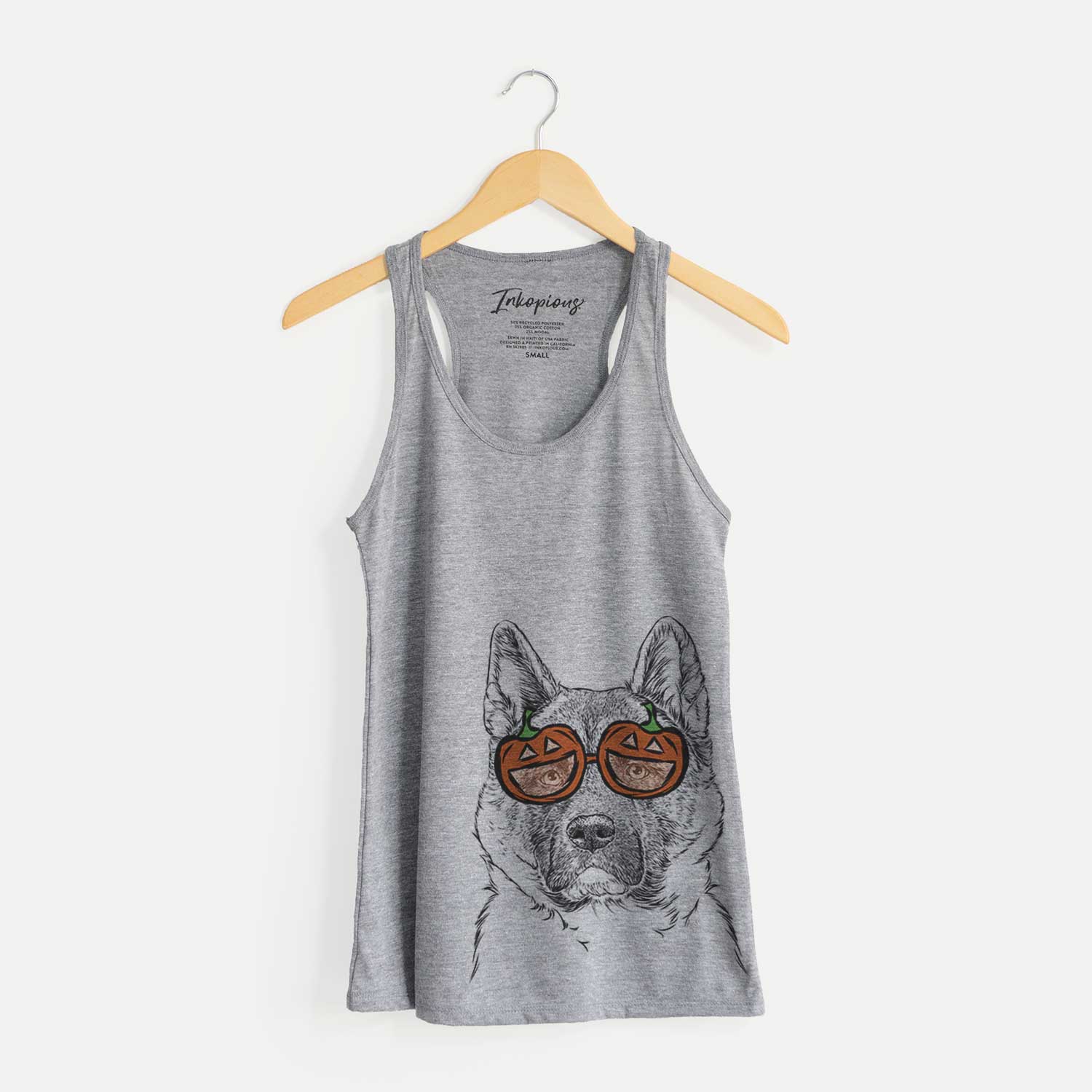 Hand-drawn sketch of Bo the American Akita wearing pumpkin glasses on a Grey pumpkin collection