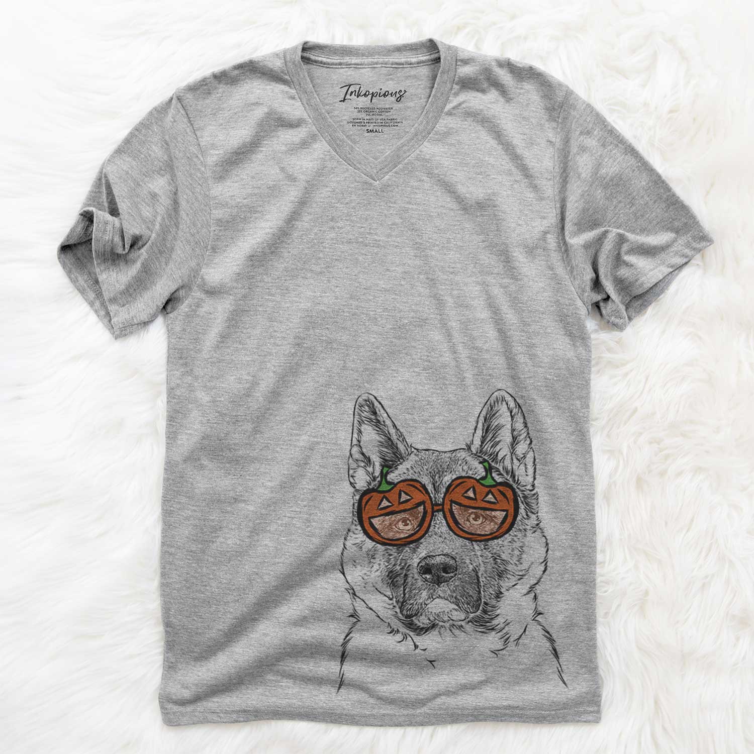 Hand-drawn sketch of Bo the American Akita wearing pumpkin glasses on a Grey pumpkin collection